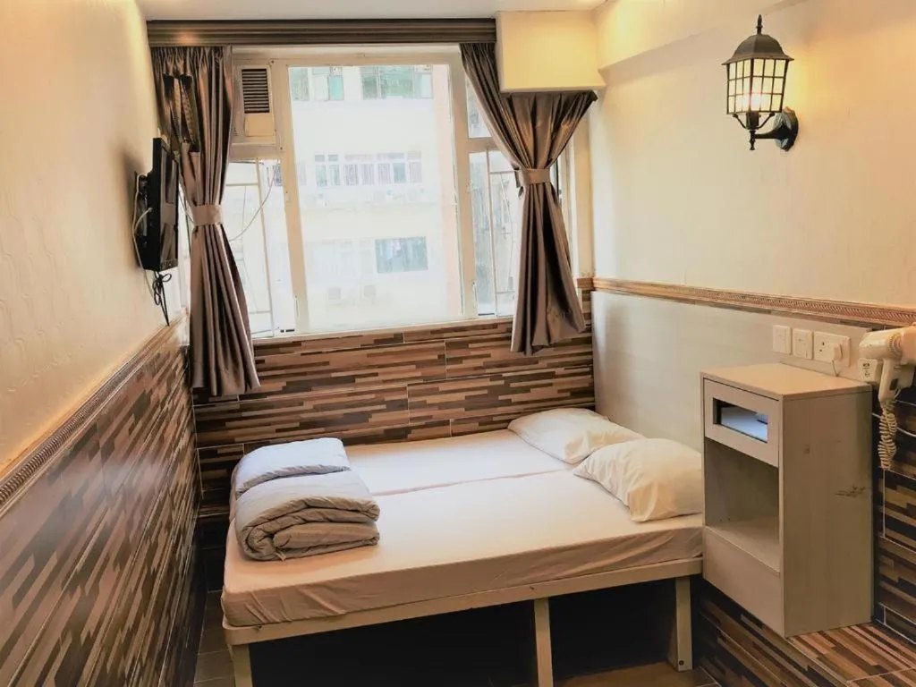 Bed in New Fortunate Guest House A1