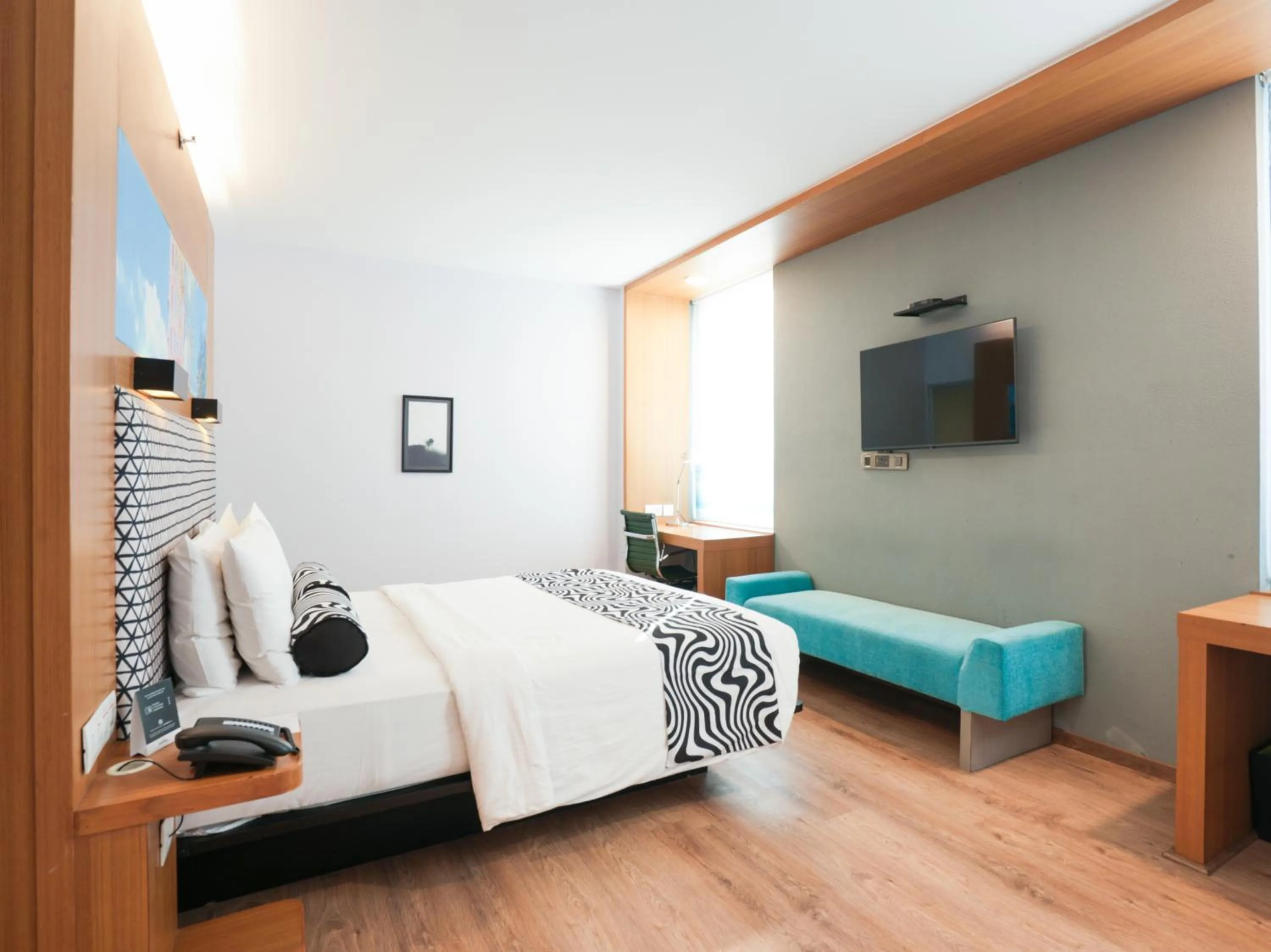 Bed in Sunday Hotel Chandigarh Zirakpur