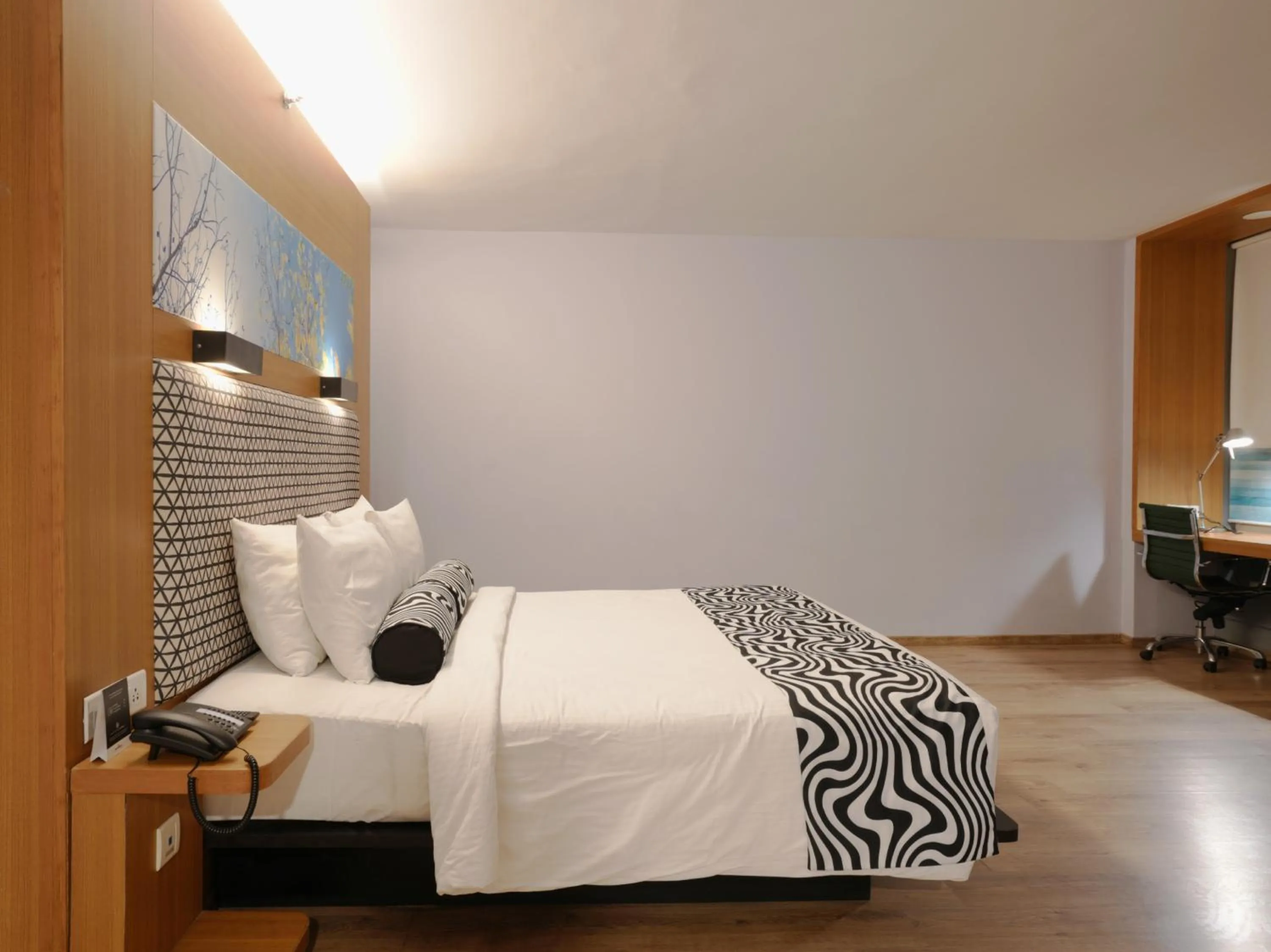 Bed in Sunday Hotel Chandigarh Zirakpur