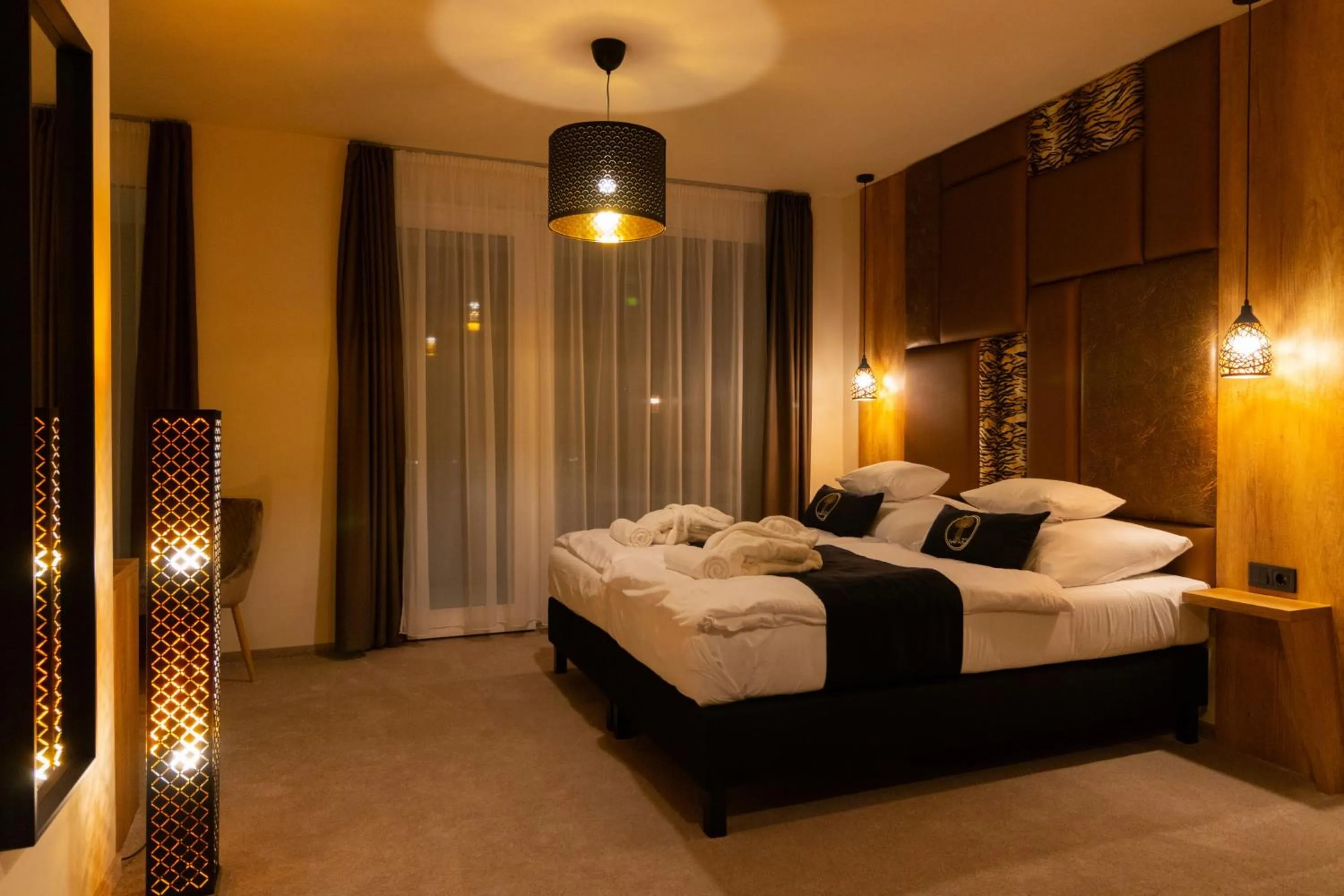 Photo of the whole room, Bed in Baobab Suites