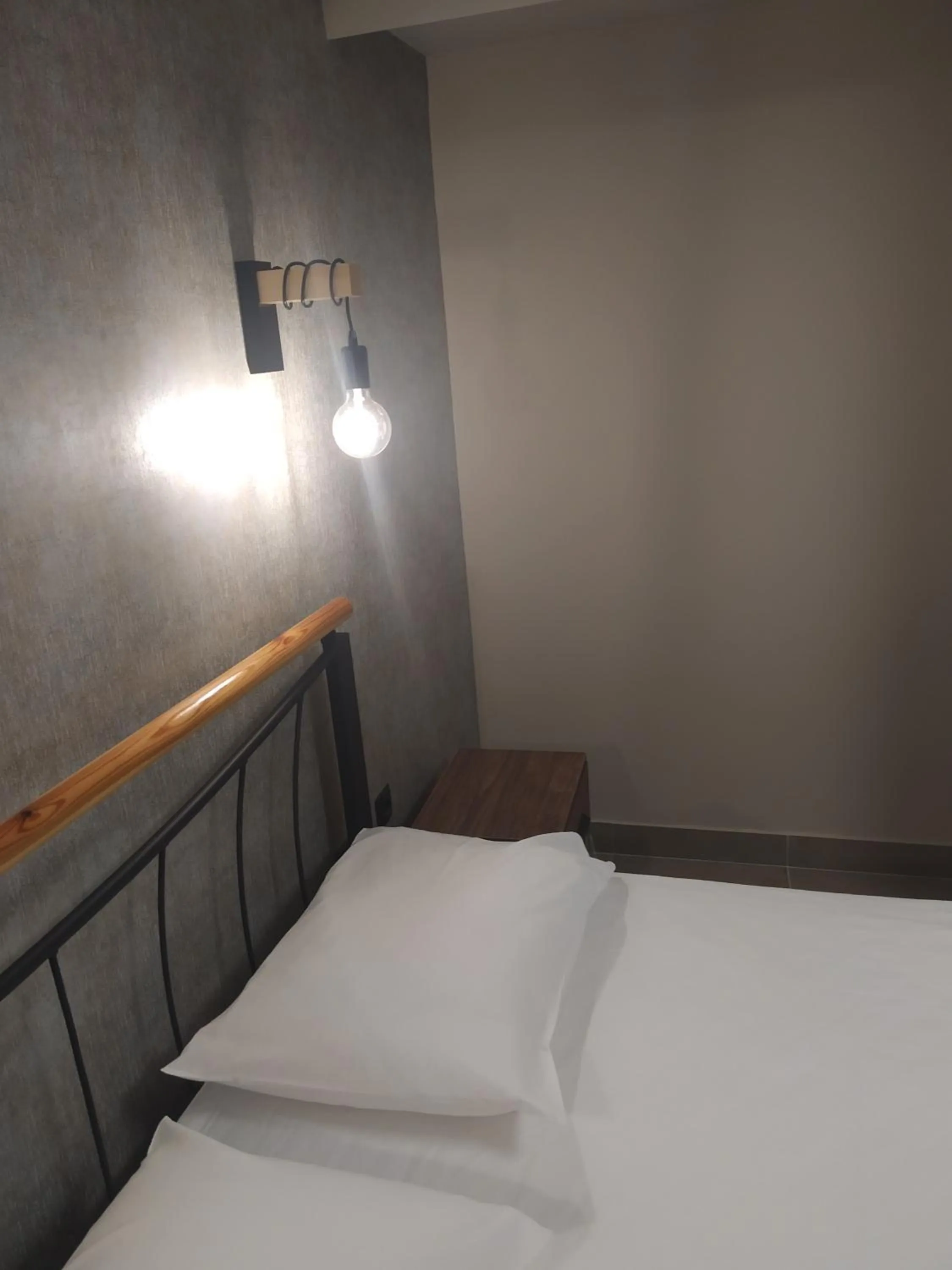 Bed in Elaėa Boutique Apartments
