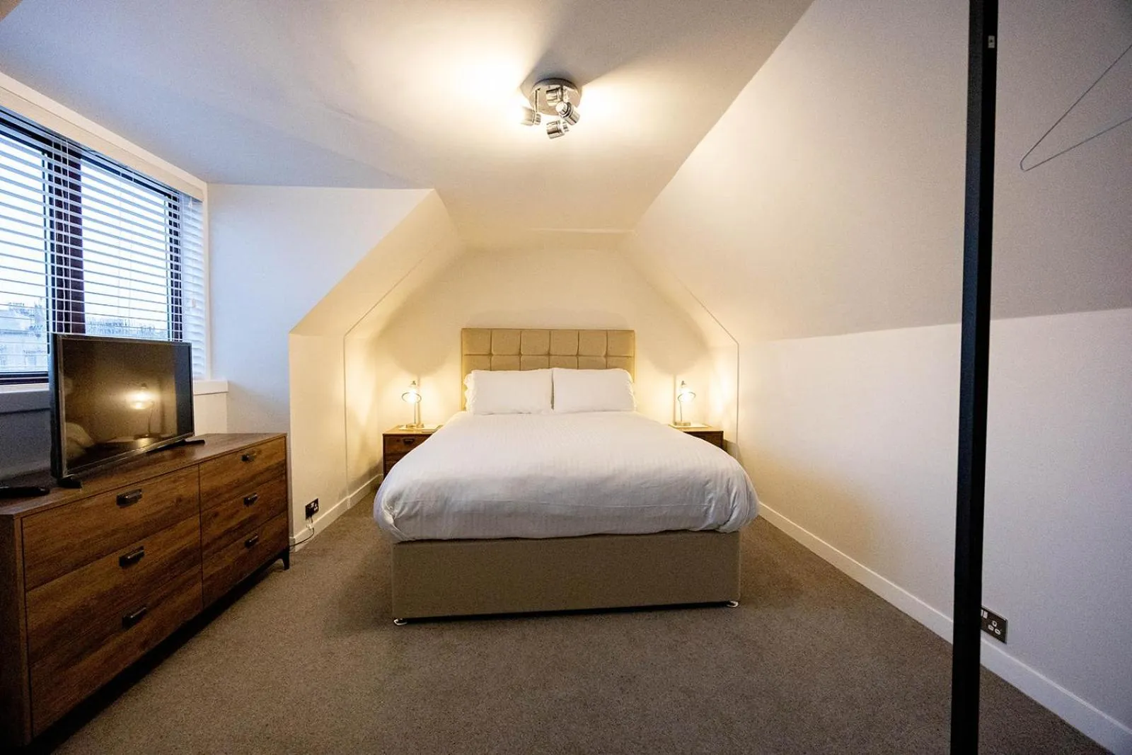 Bed in New Inn Hotel