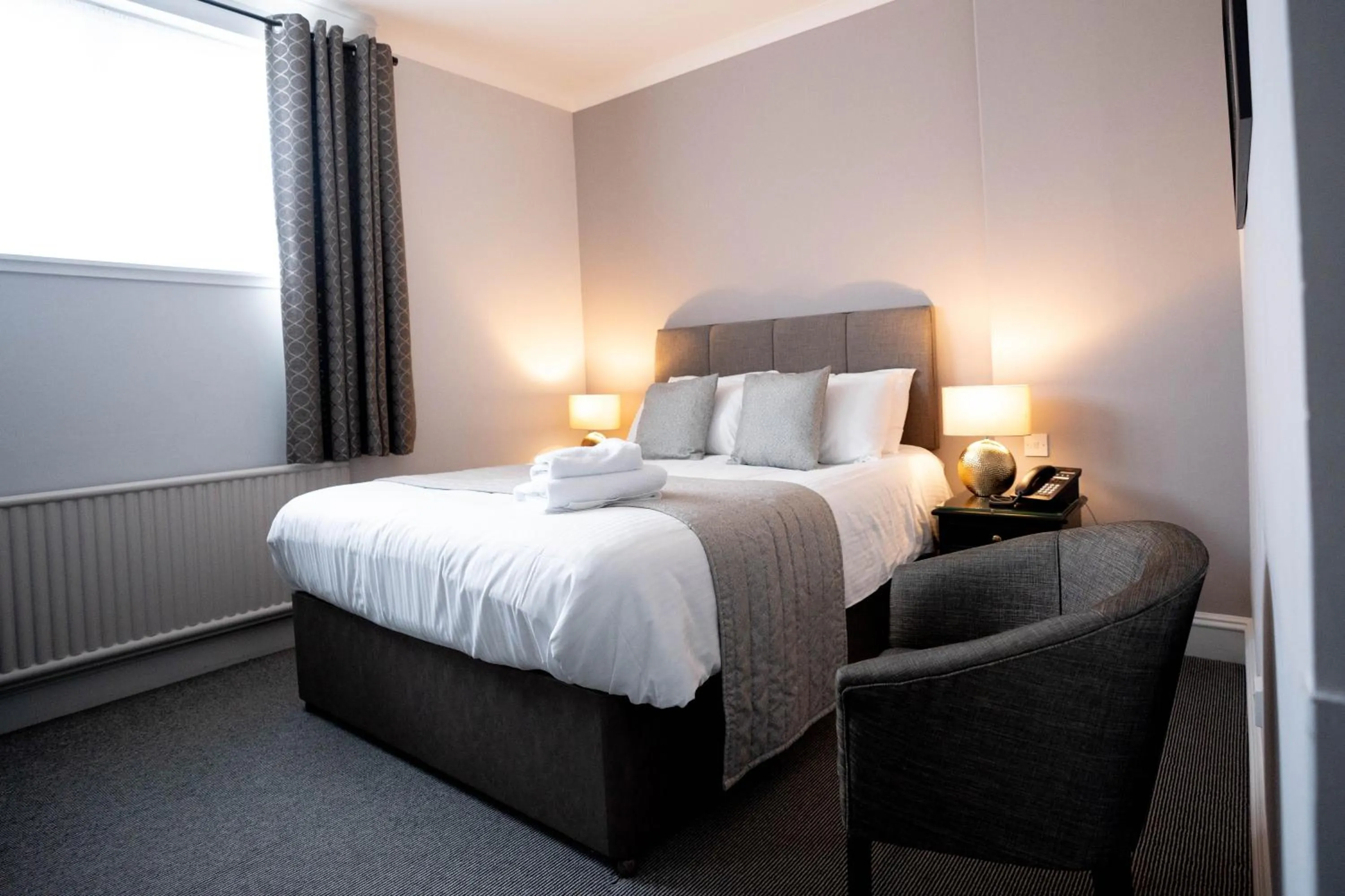 Bed in New Inn Hotel