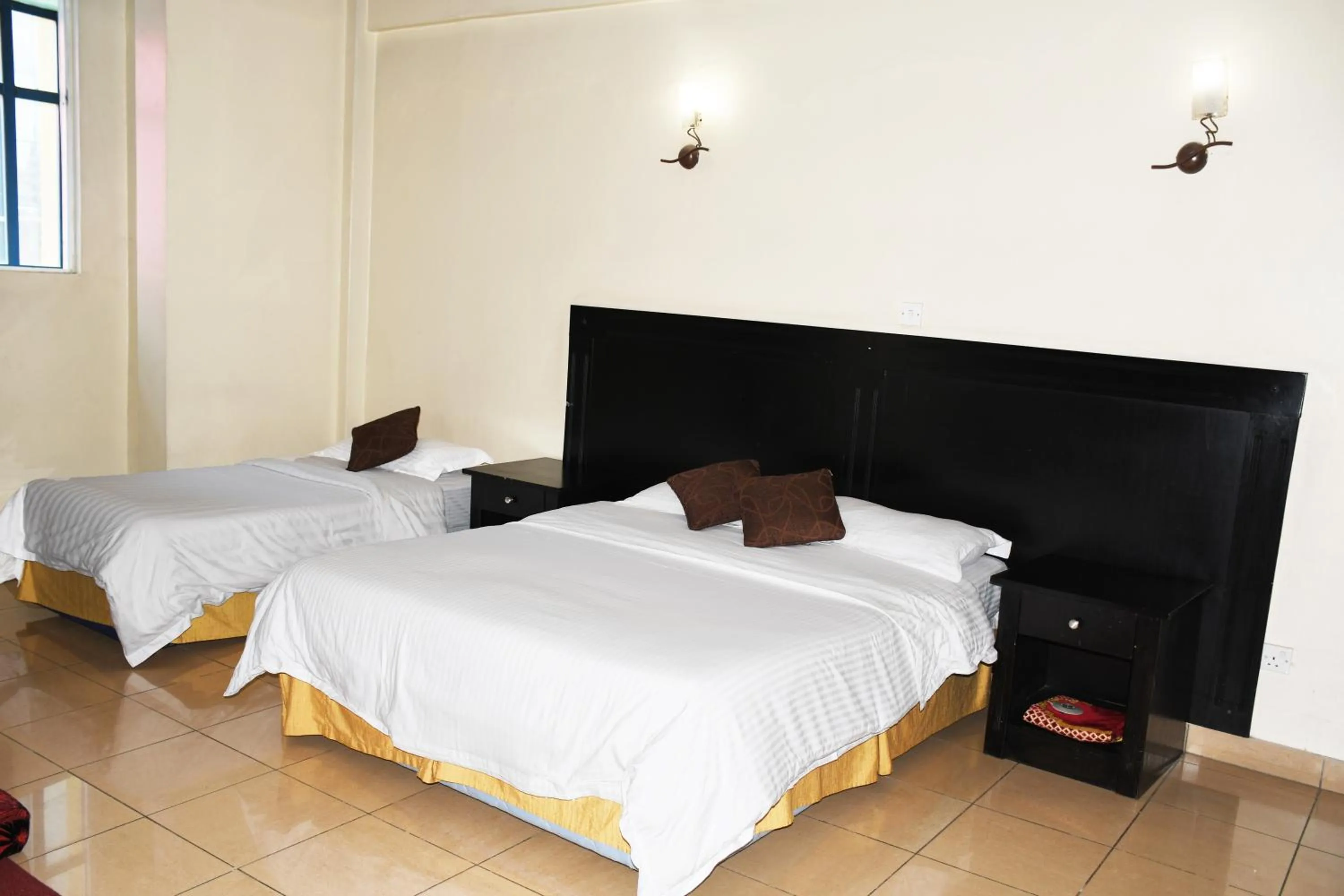 Photo of the whole room, Bed in Jamia Central Hotel