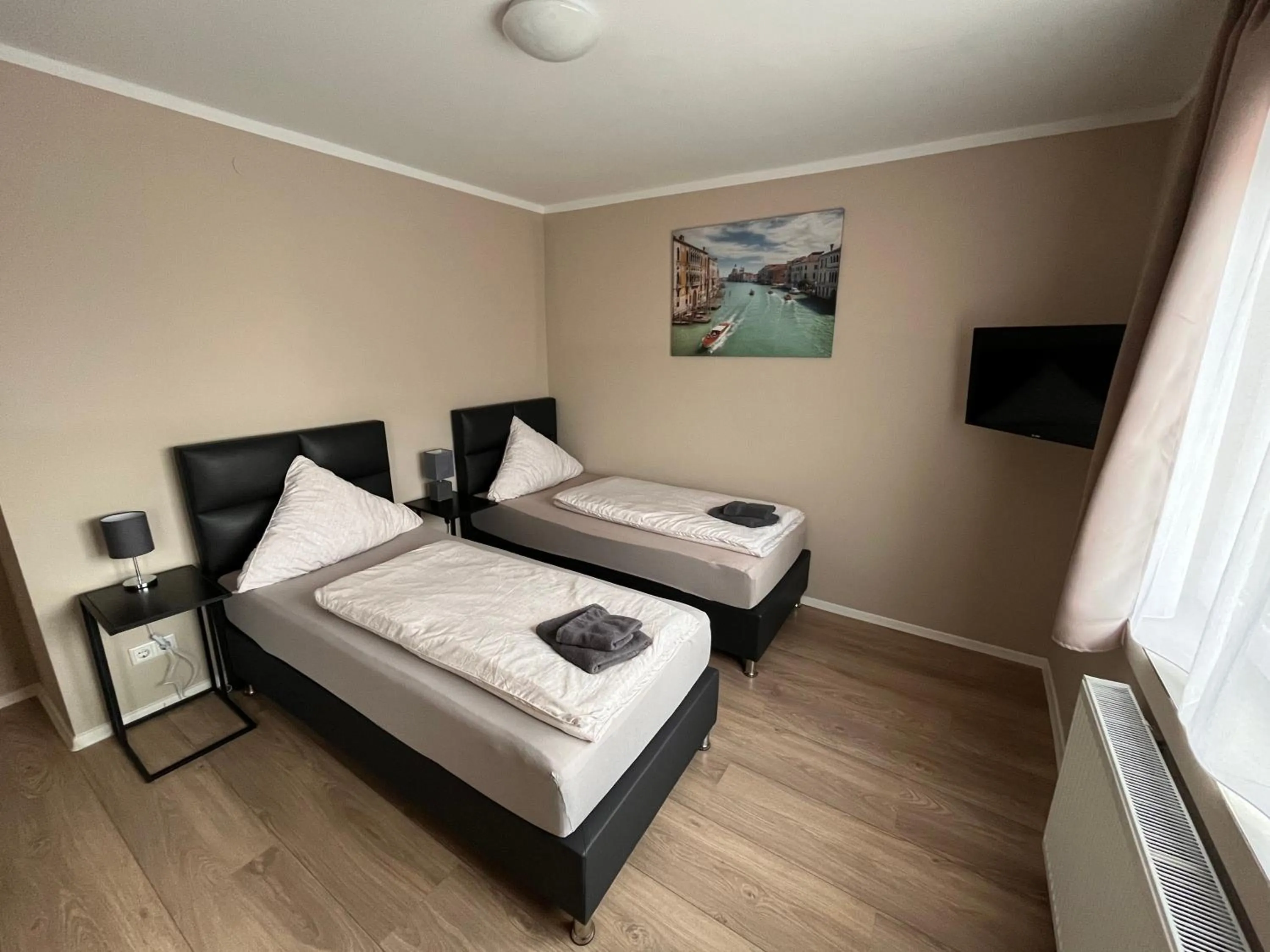 Bed in Checkinn Hotel