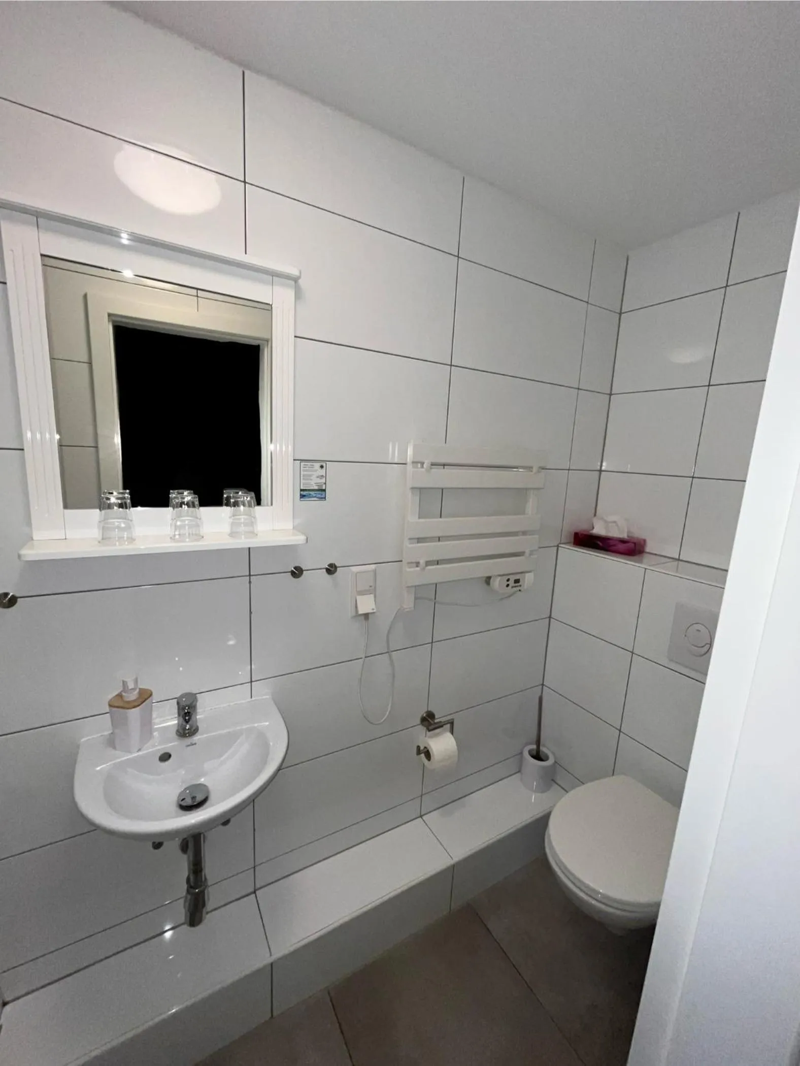 Shower in Checkinn Hotel