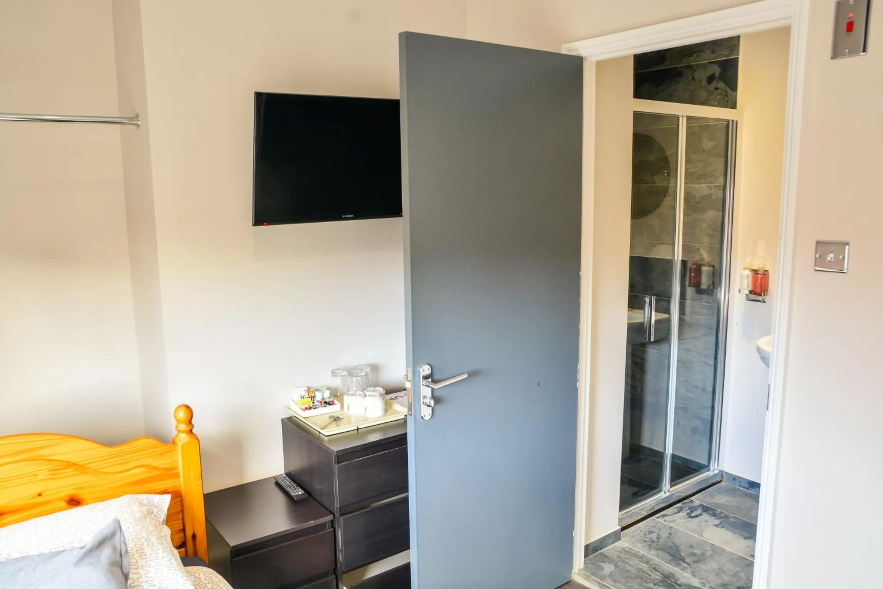 Bedroom, TV/Entertainment Center in Arches Guest House