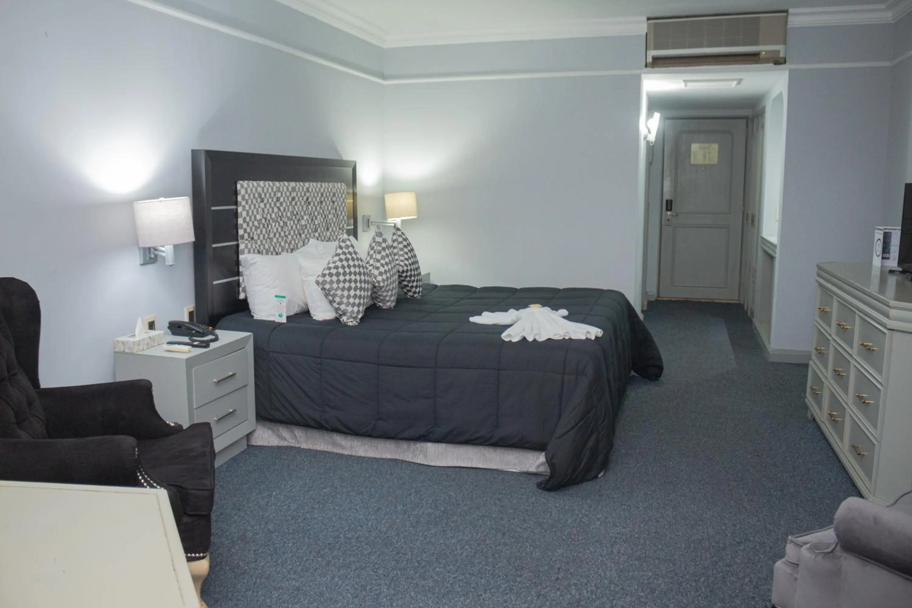 Photo of the whole room, Bed in Nk Hotel Nekié Tepic