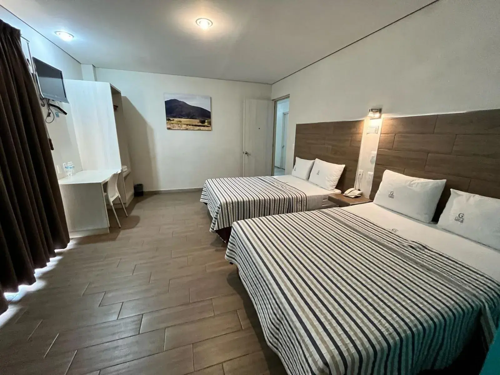 Quadruple Room in Hotel Guivá Aeropuerto Quadruple Room in Hotel Guivá Aeropuerto