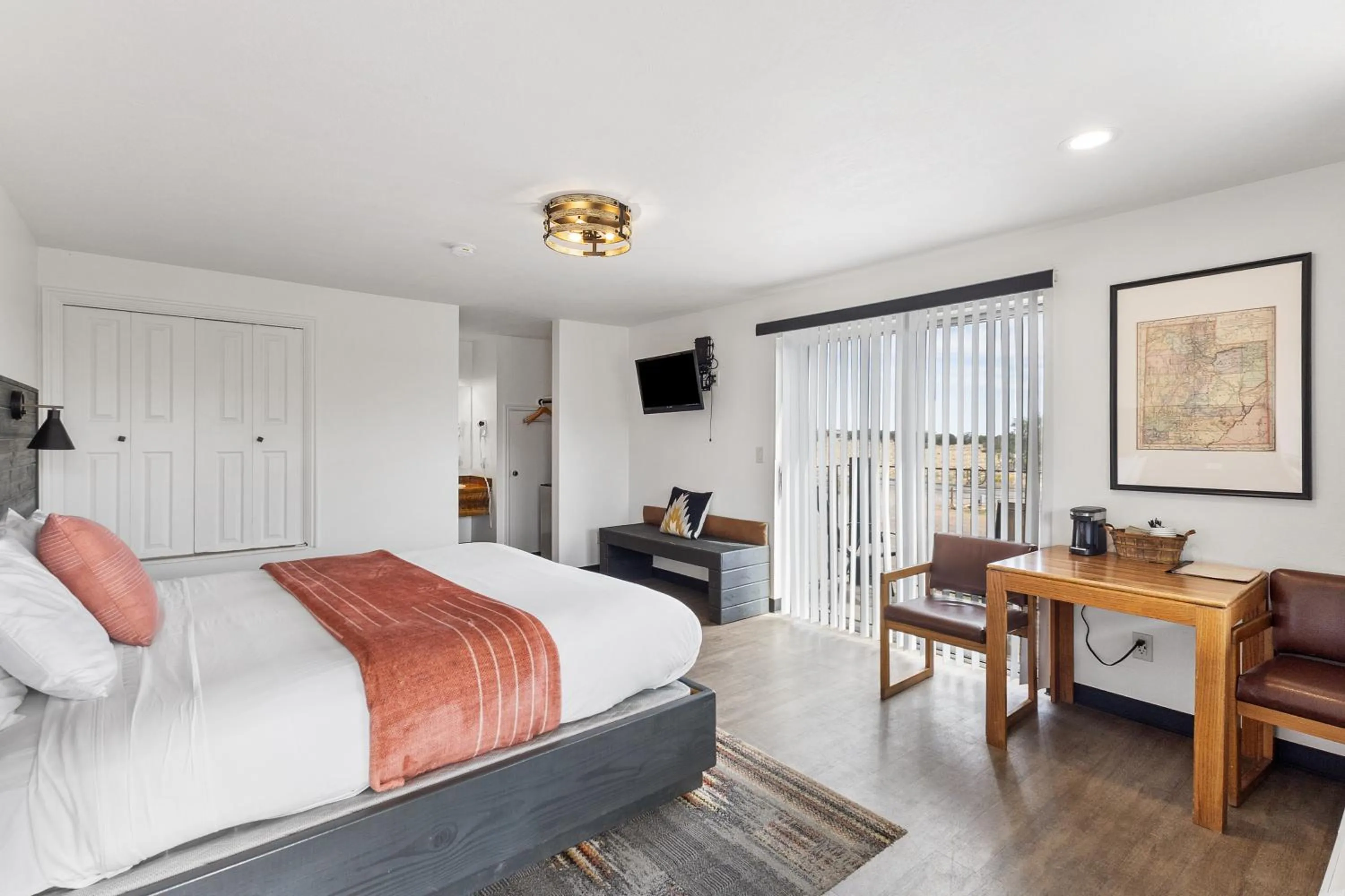 Bed in Broken Spur Inn & Steakhouse