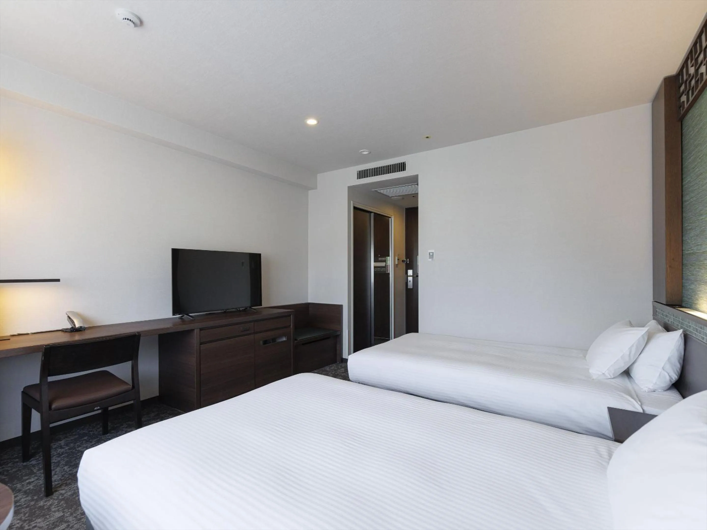 Photo of the whole room, Bed in JR Kyushu Hotel Nagasaki