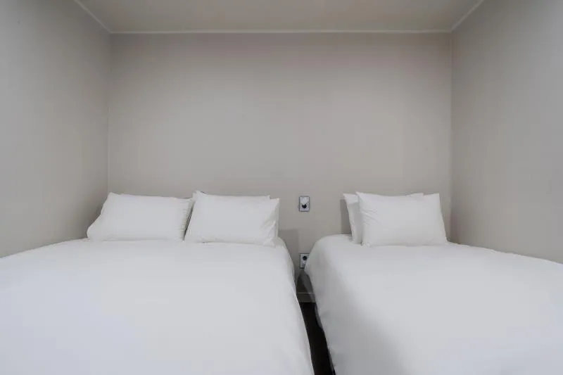 Bed in MAYONE HOTEL Myeongdong