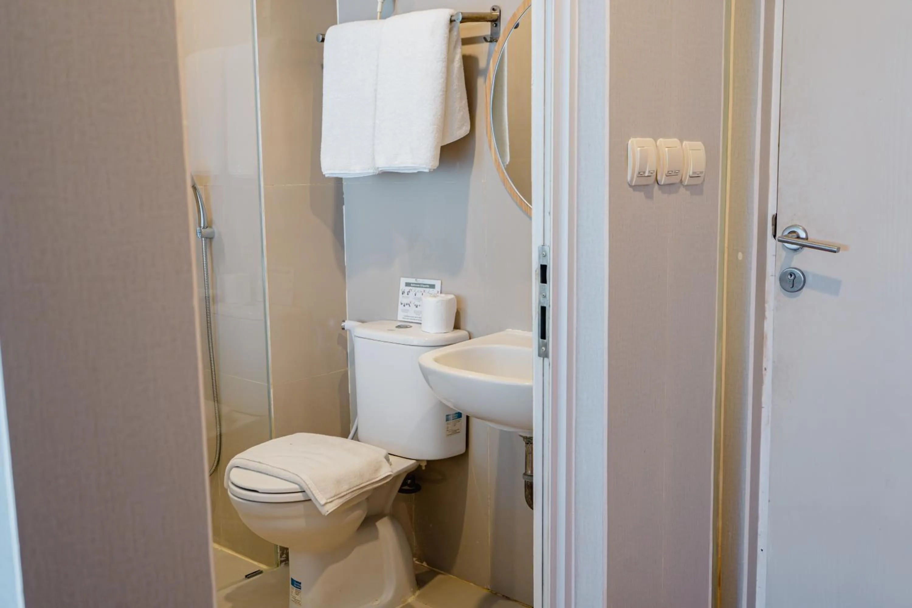 Shower in The Rooms Apartment Bali by ARM Hospitality