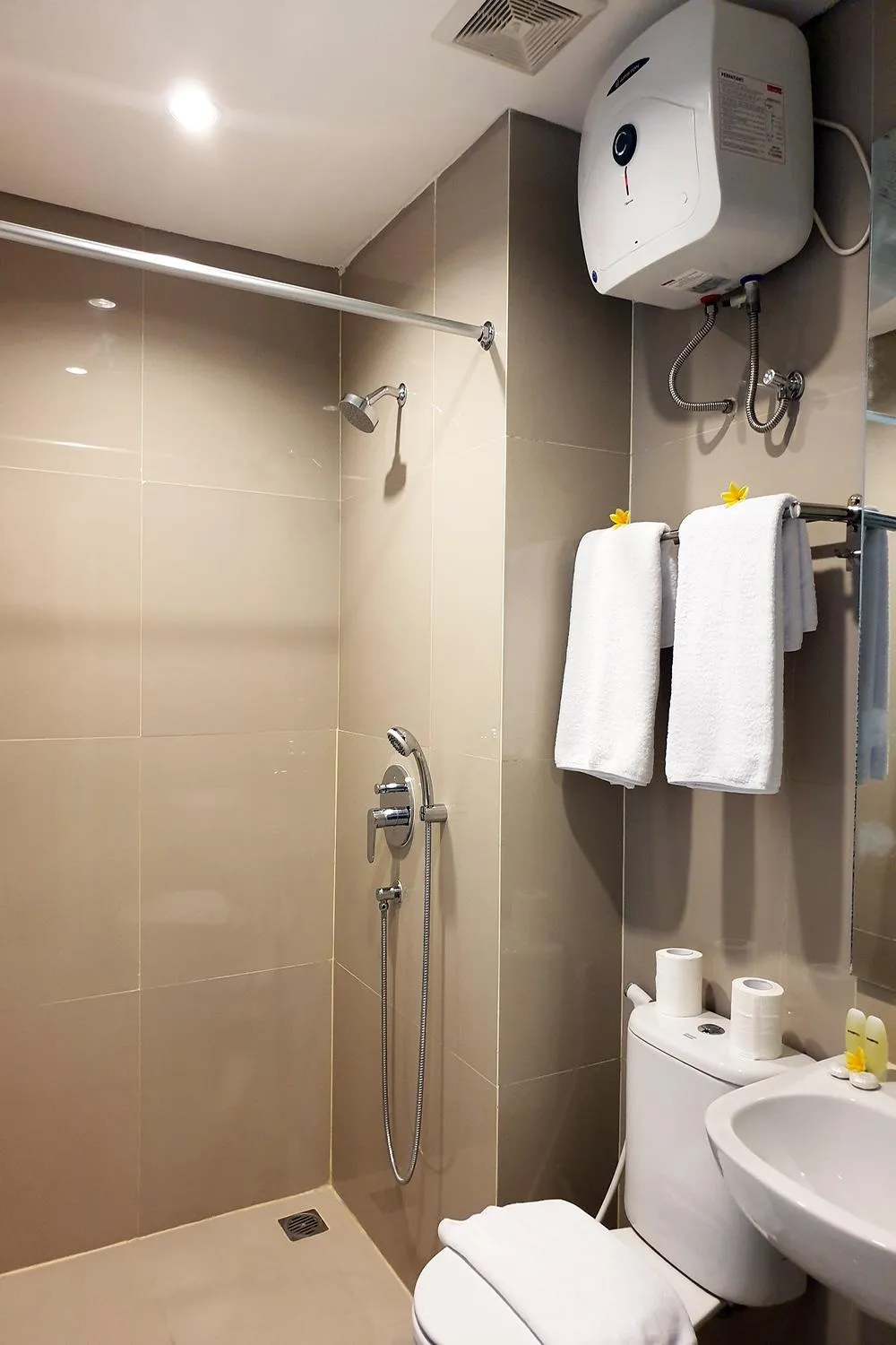 Bathroom in The Rooms Apartment Bali by ARM Hospitality