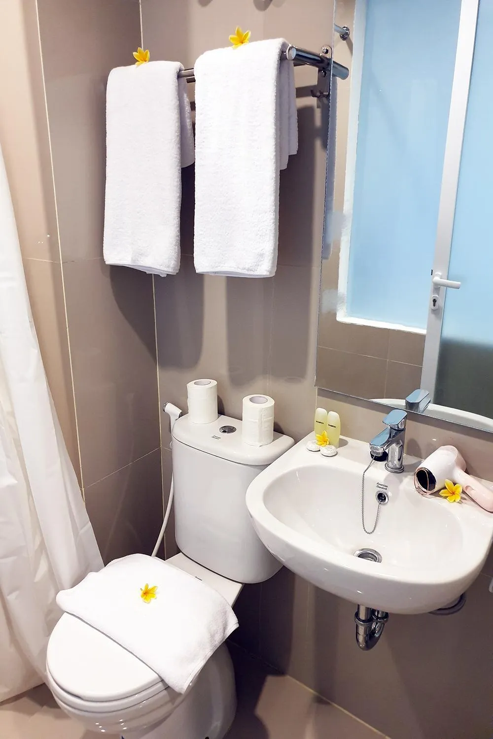 Bathroom in The Rooms Apartment Bali by ARM Hospitality