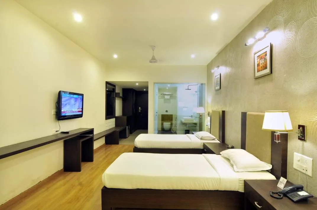 Photo of the whole room, Bed in Hotel Aditya