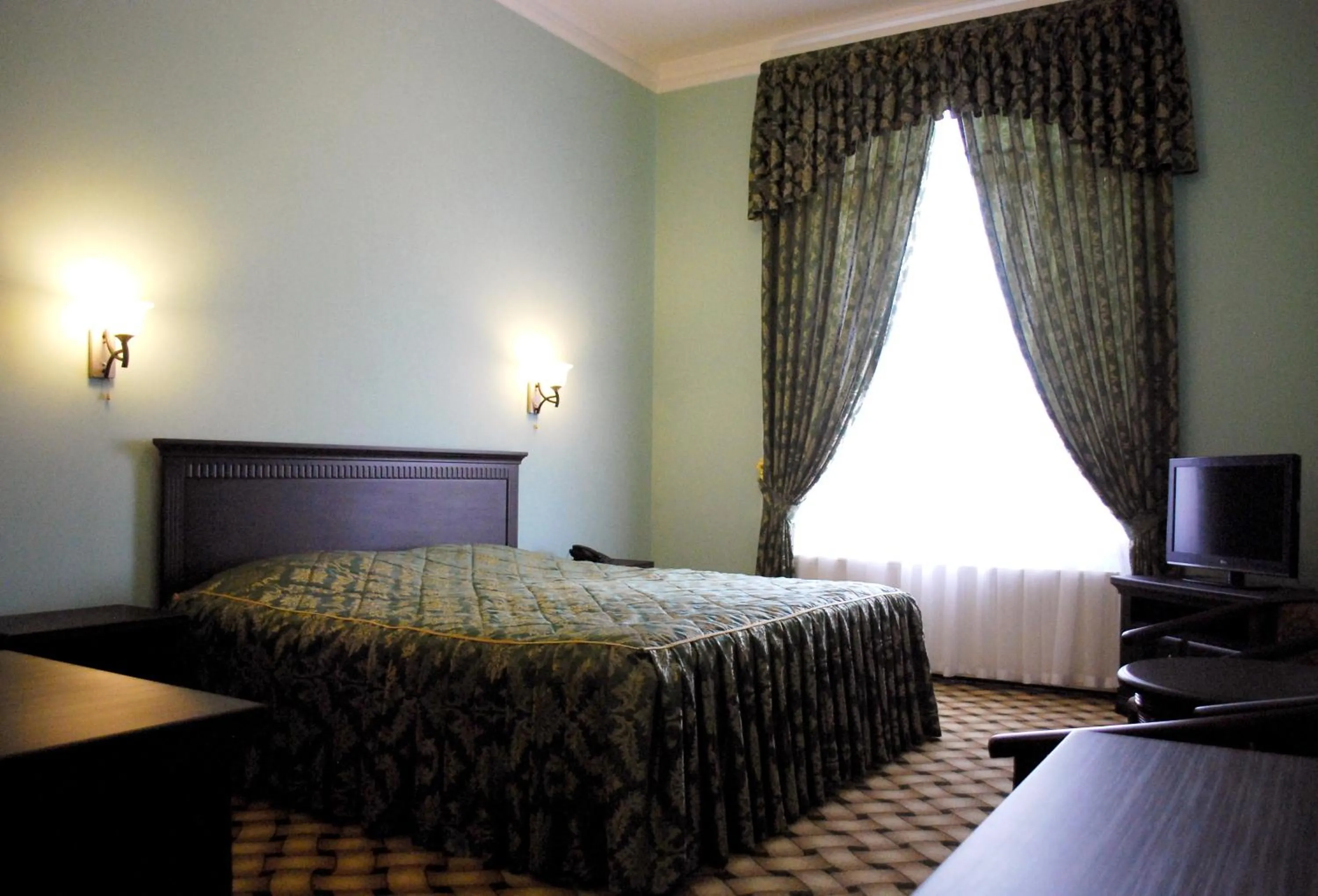 Photo of the whole room, Bed in Jahon Palace