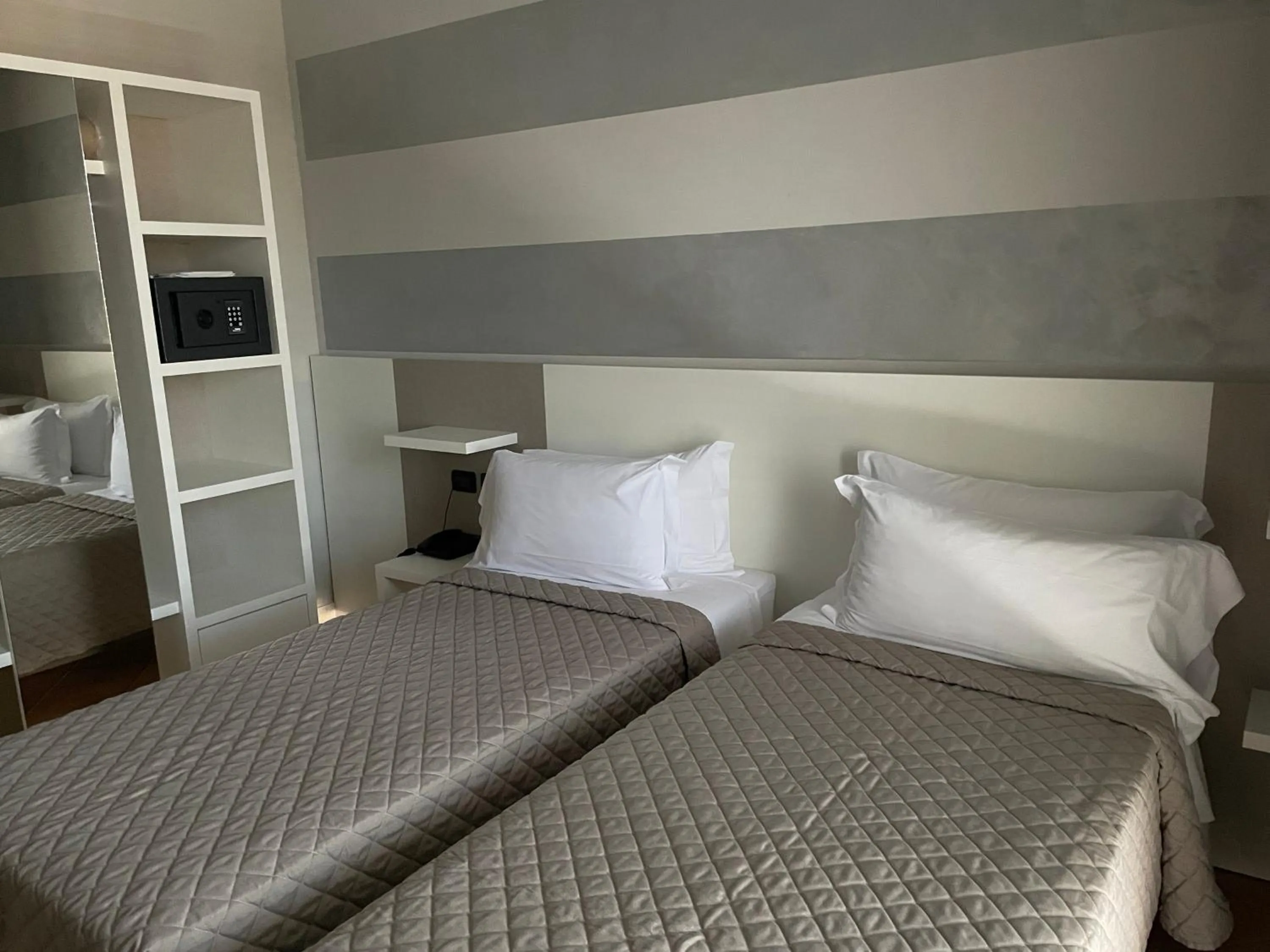 Bedroom in Hotel Villa Rosa