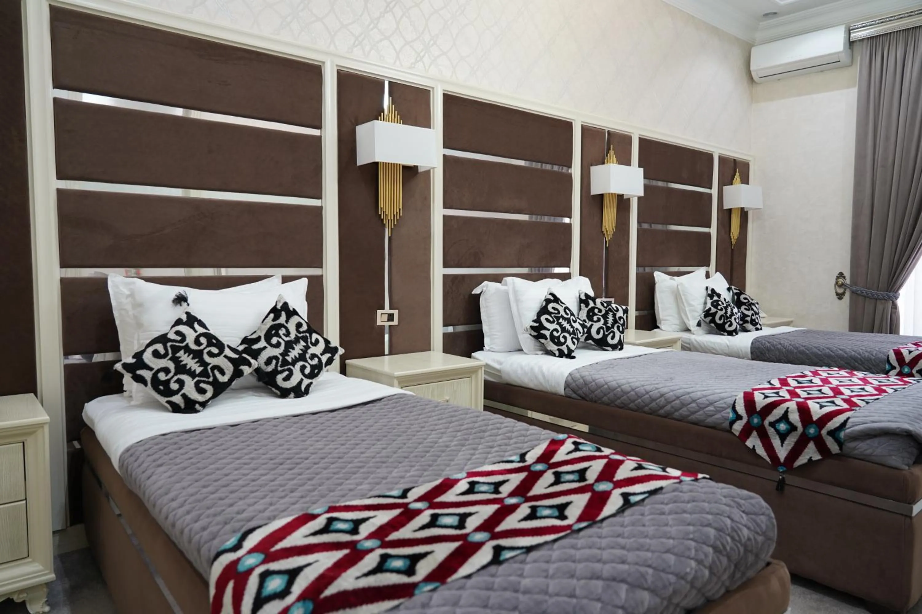 Bed in Shaxzoda Elite Hotel