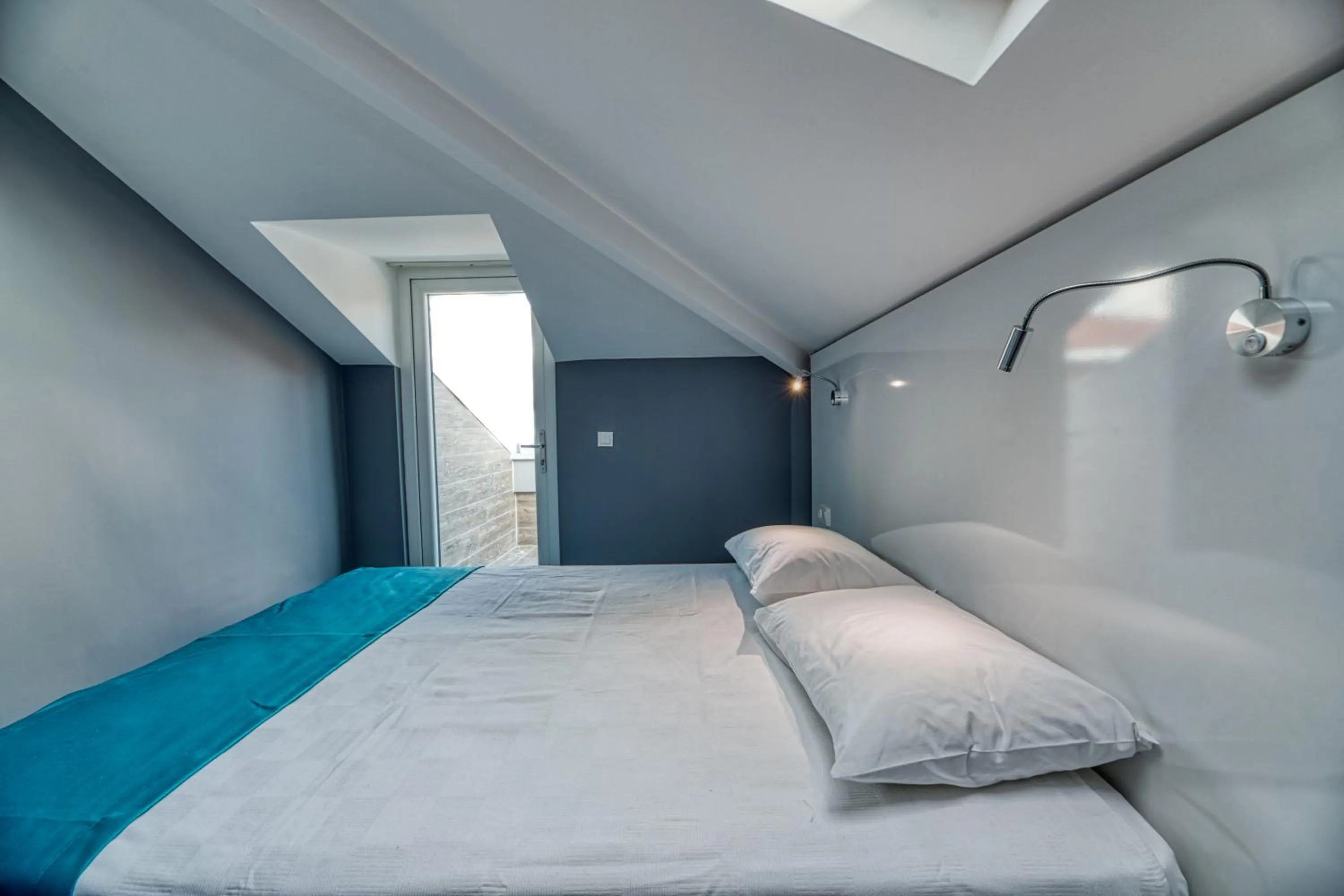 Bed in Grisverde Suites