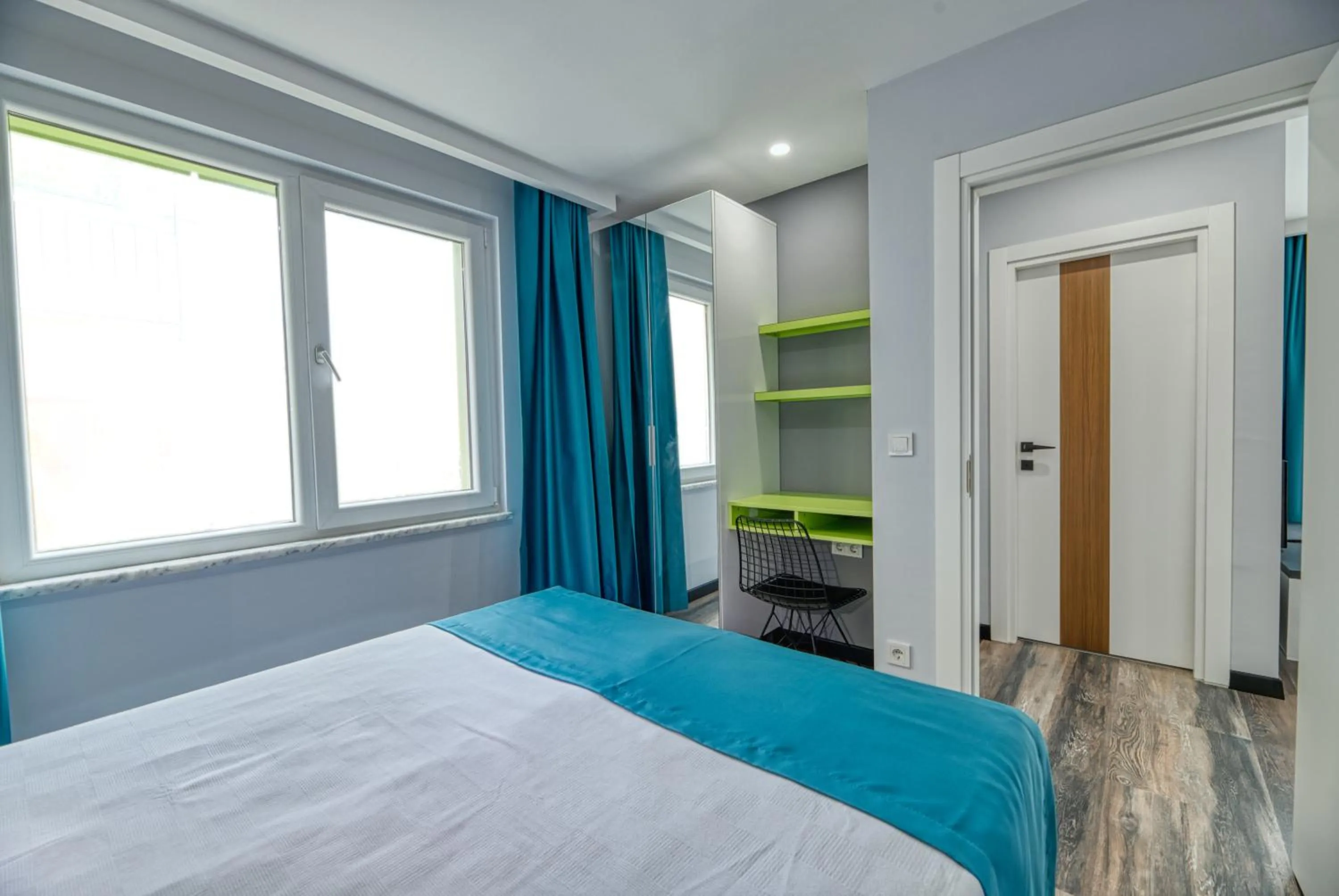 Bed in Grisverde Suites