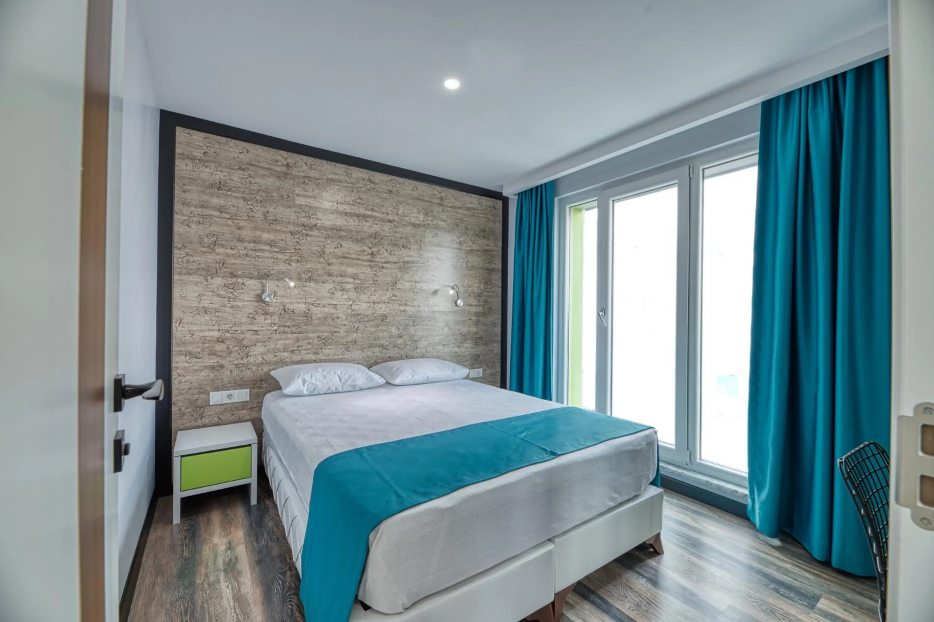 Bed in Grisverde Suites