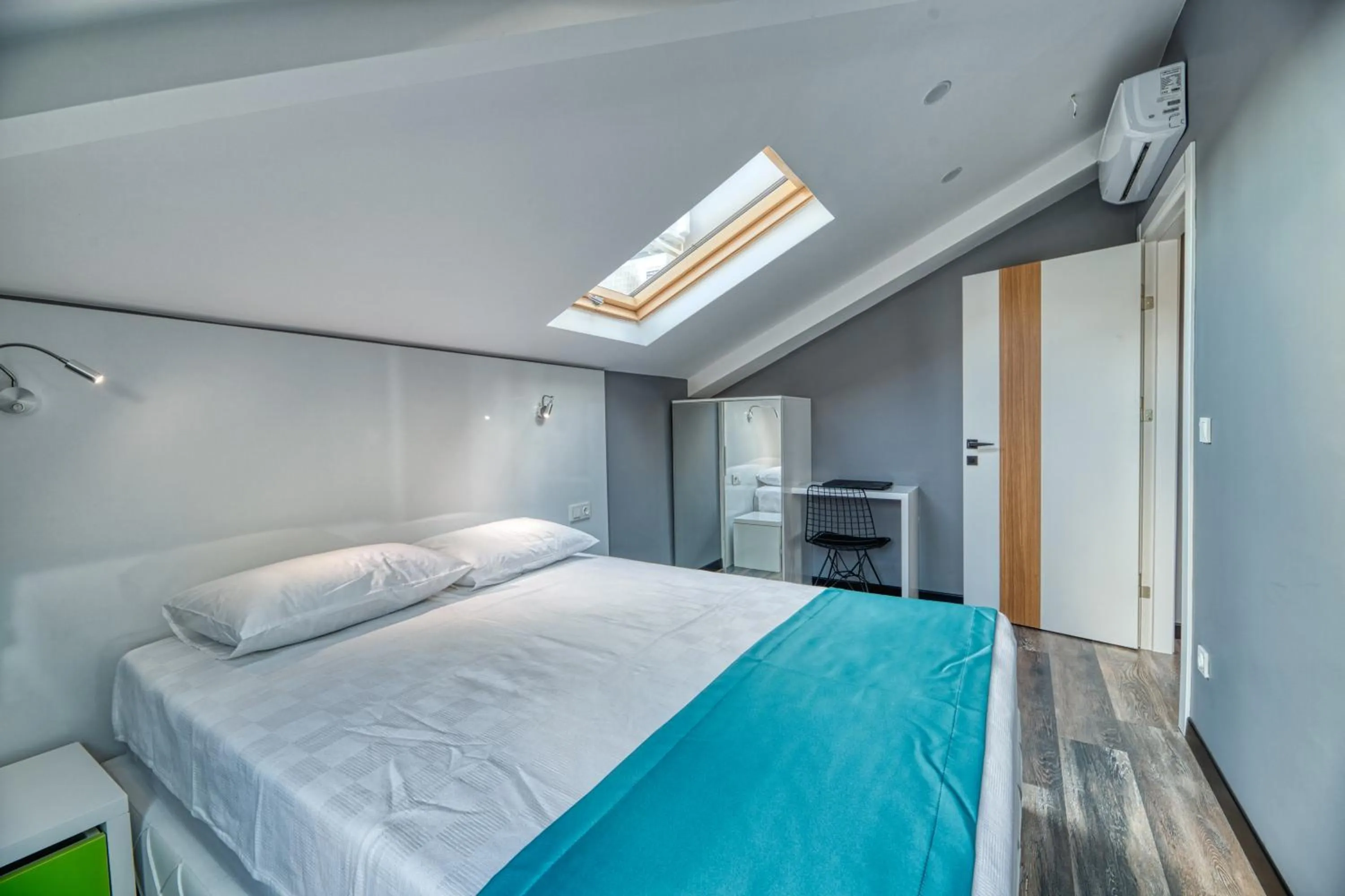 Bed in Grisverde Suites