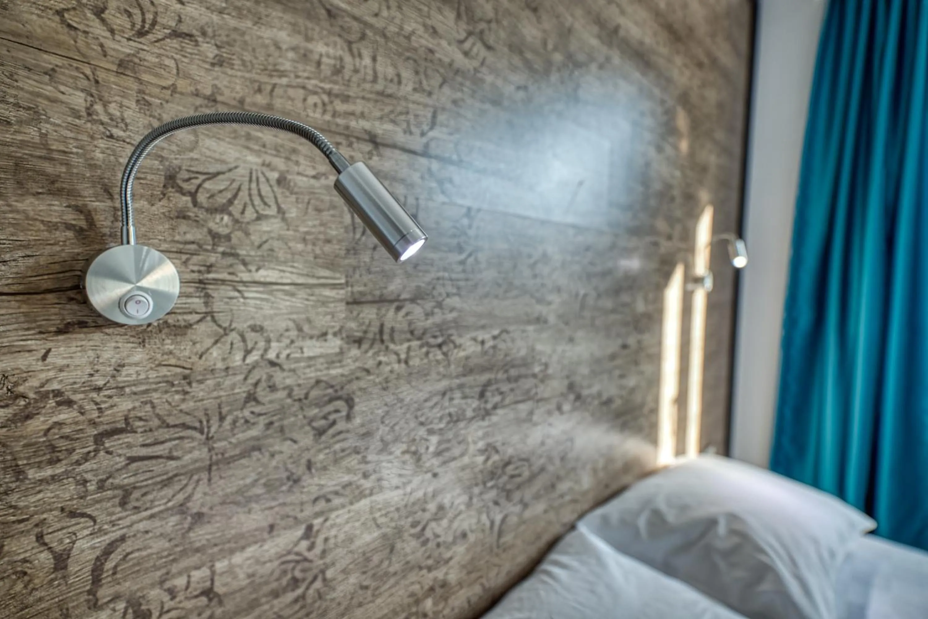 Bed in Grisverde Suites