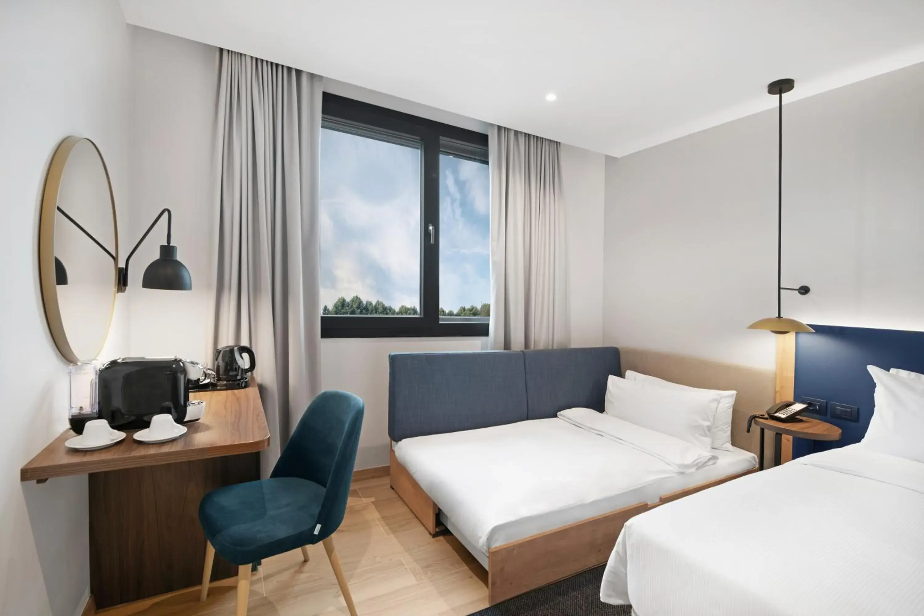 King Room with Sofa Bed in Hilton Garden Inn Bucharest Airport King Room with Sofa Bed in Hilton Garden Inn Bucharest Airport