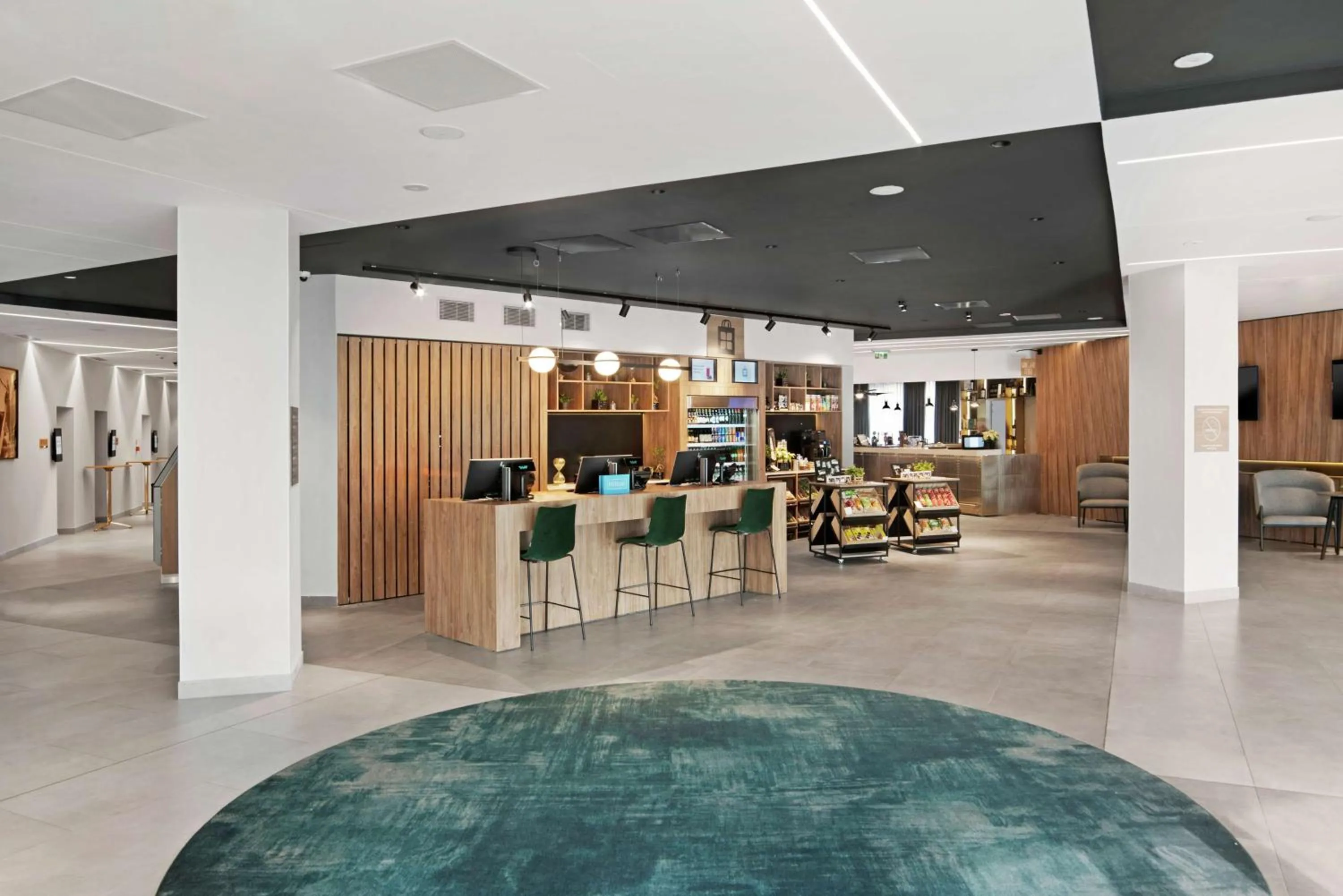 Lobby or reception in Hilton Garden Inn Bucharest Airport