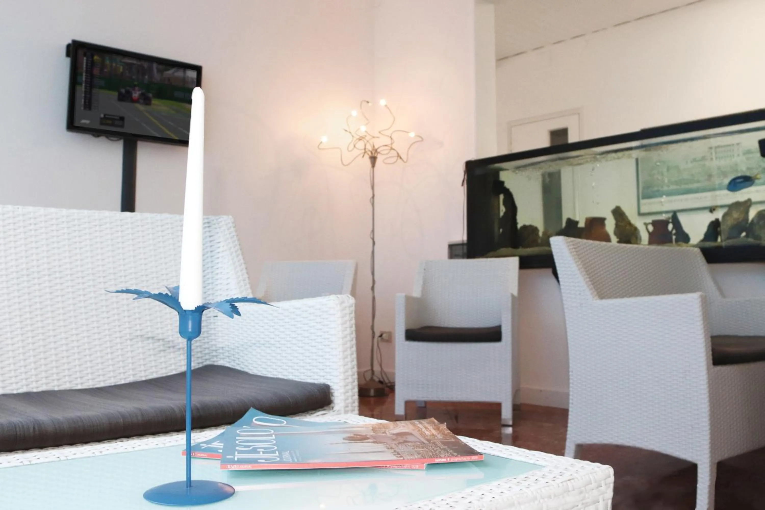 Communal lounge/ TV room in Villa Serena