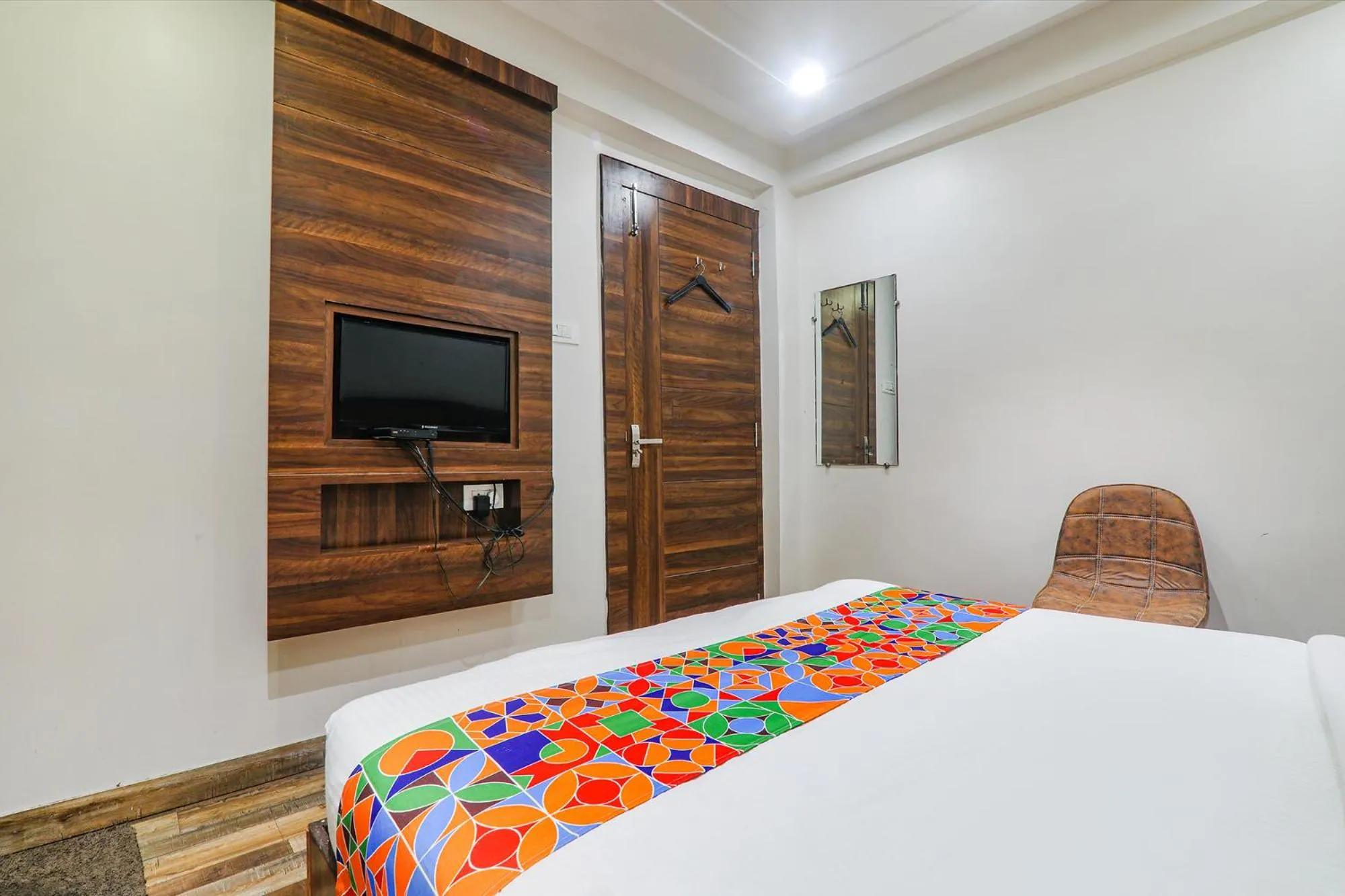 Bed in FabHotel Bless Inn