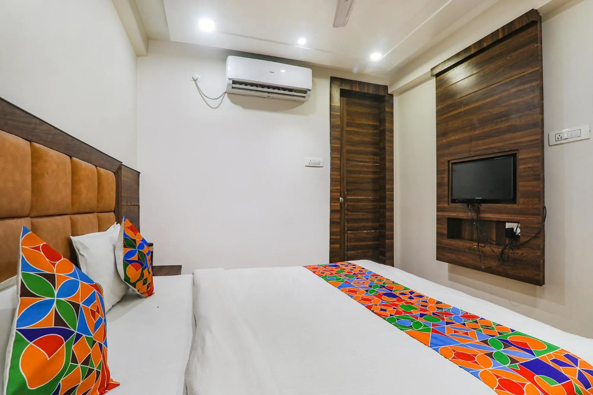 Bed in FabHotel Bless Inn