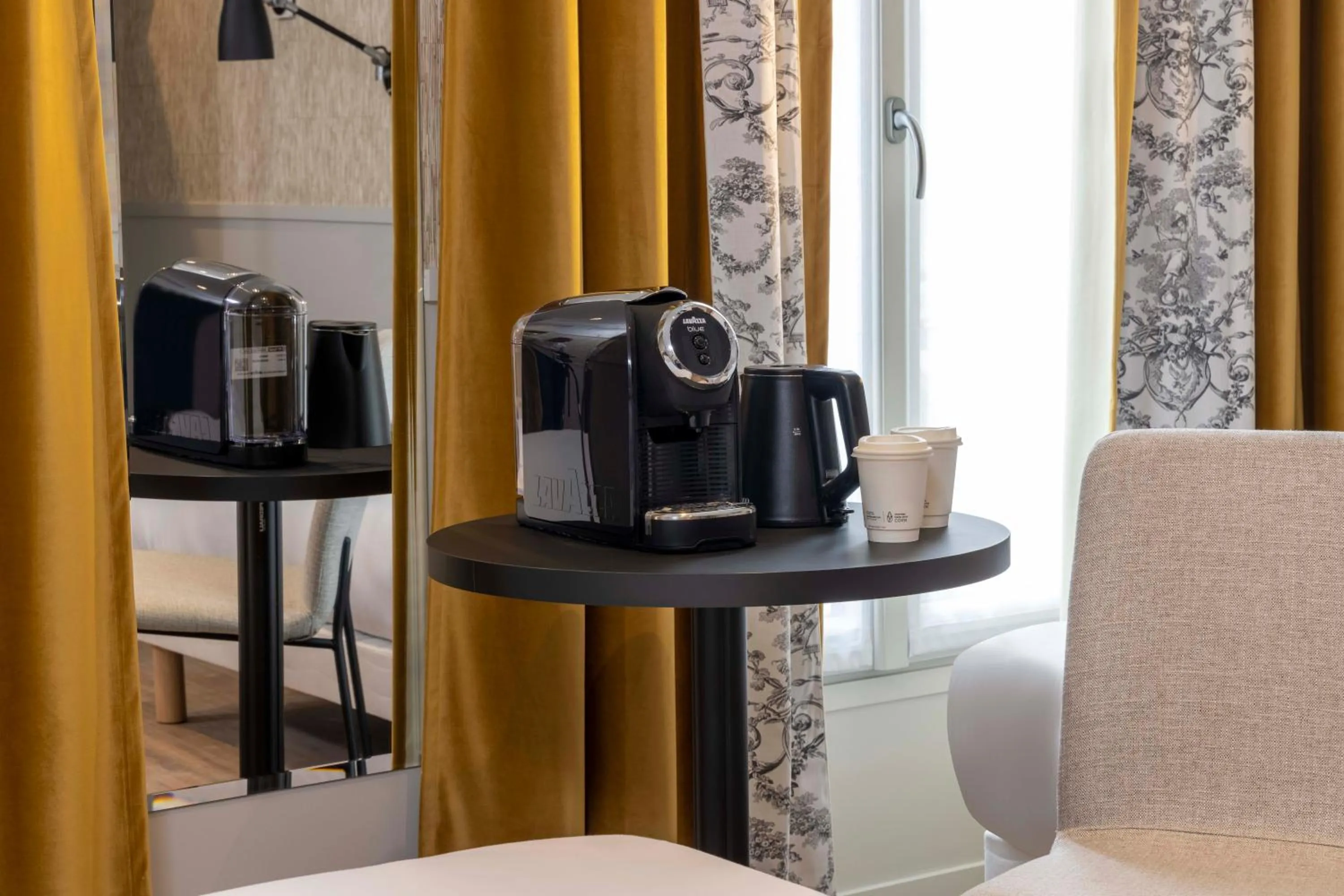 Coffee/tea facilities in Grand Hôtel Lévêque