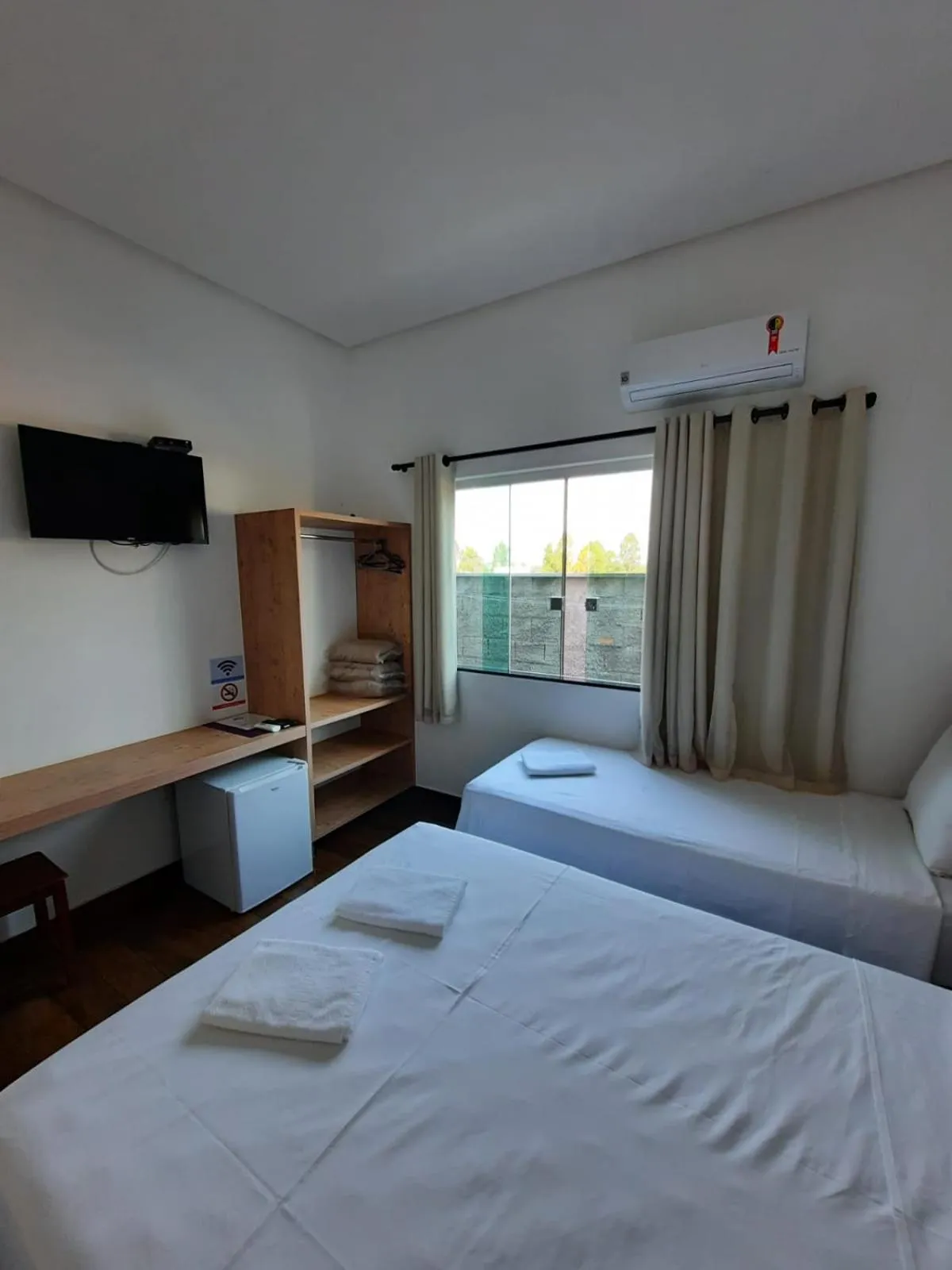 Bed in POUSADA LIMAS SUITES