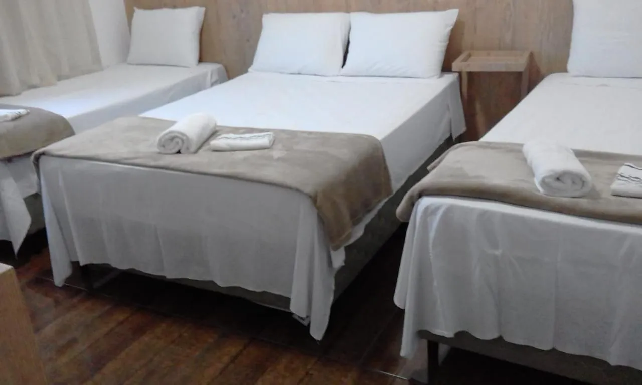 Bed in POUSADA LIMAS SUITES