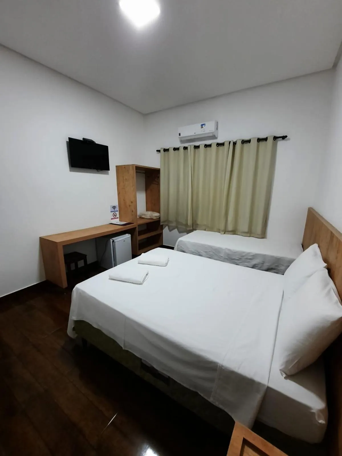 Bed in POUSADA LIMAS SUITES