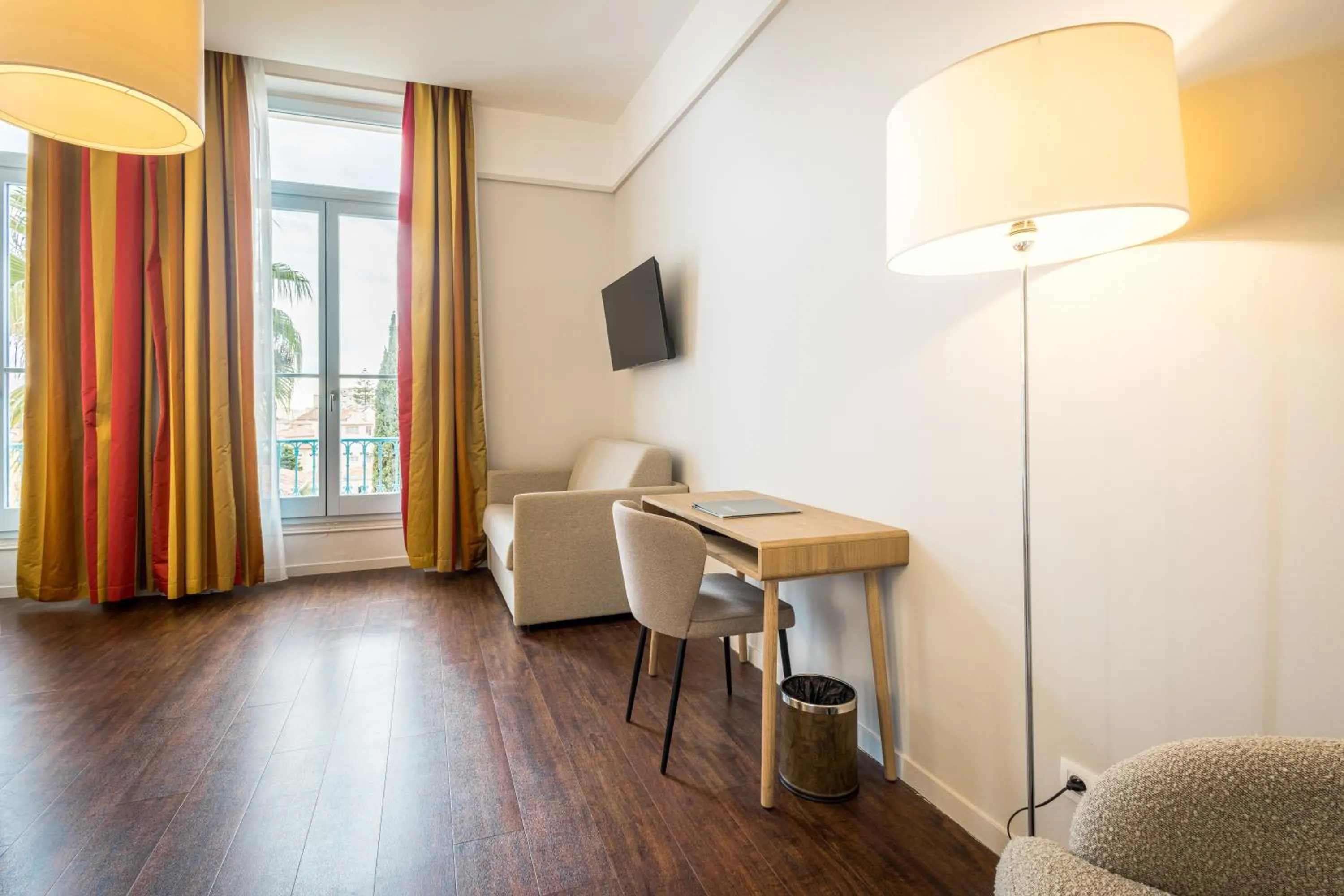 Seating area in Hôtel Miléade L'Orangeraie - entièrement rénové