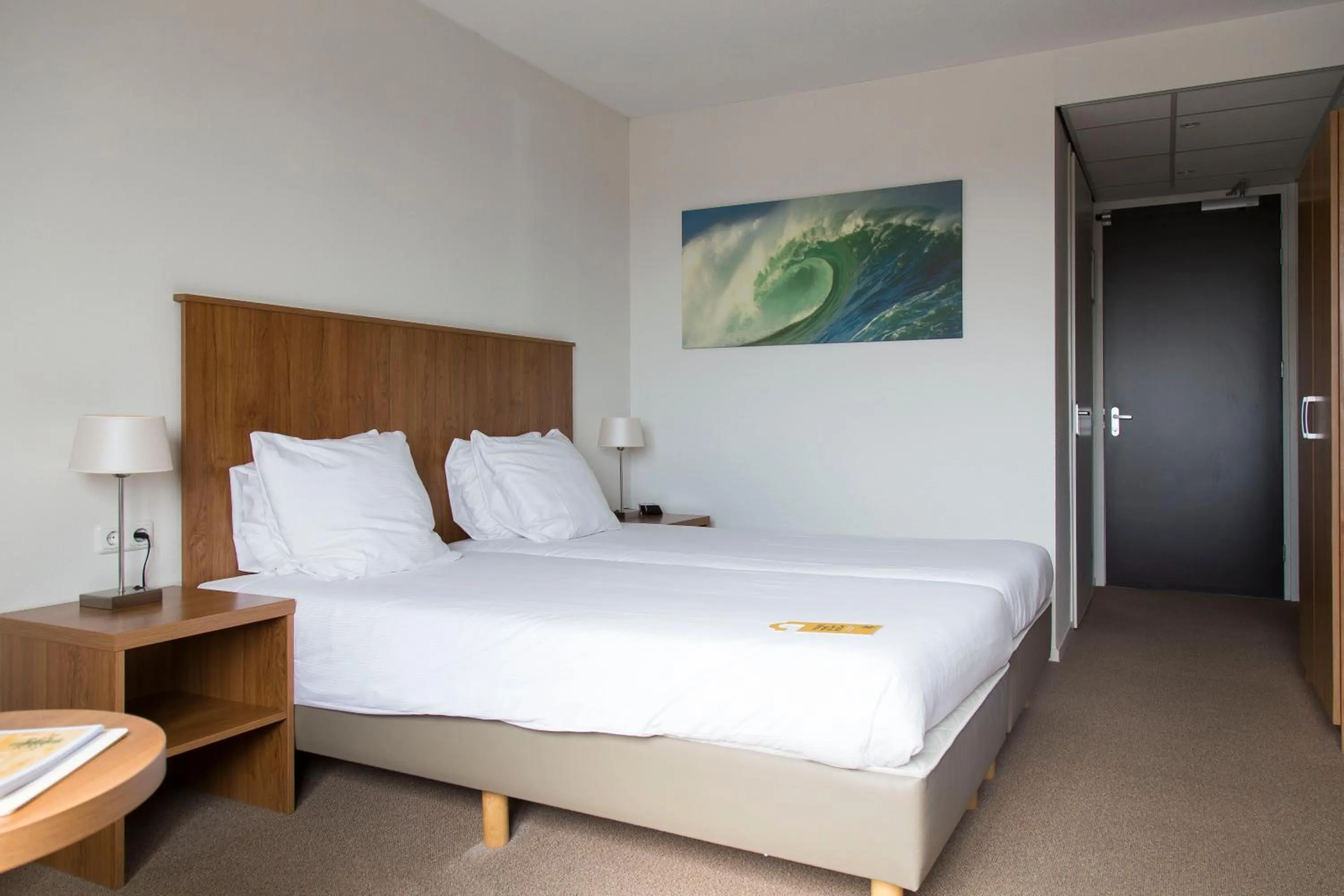 Bed in Strandhotel Vigilante