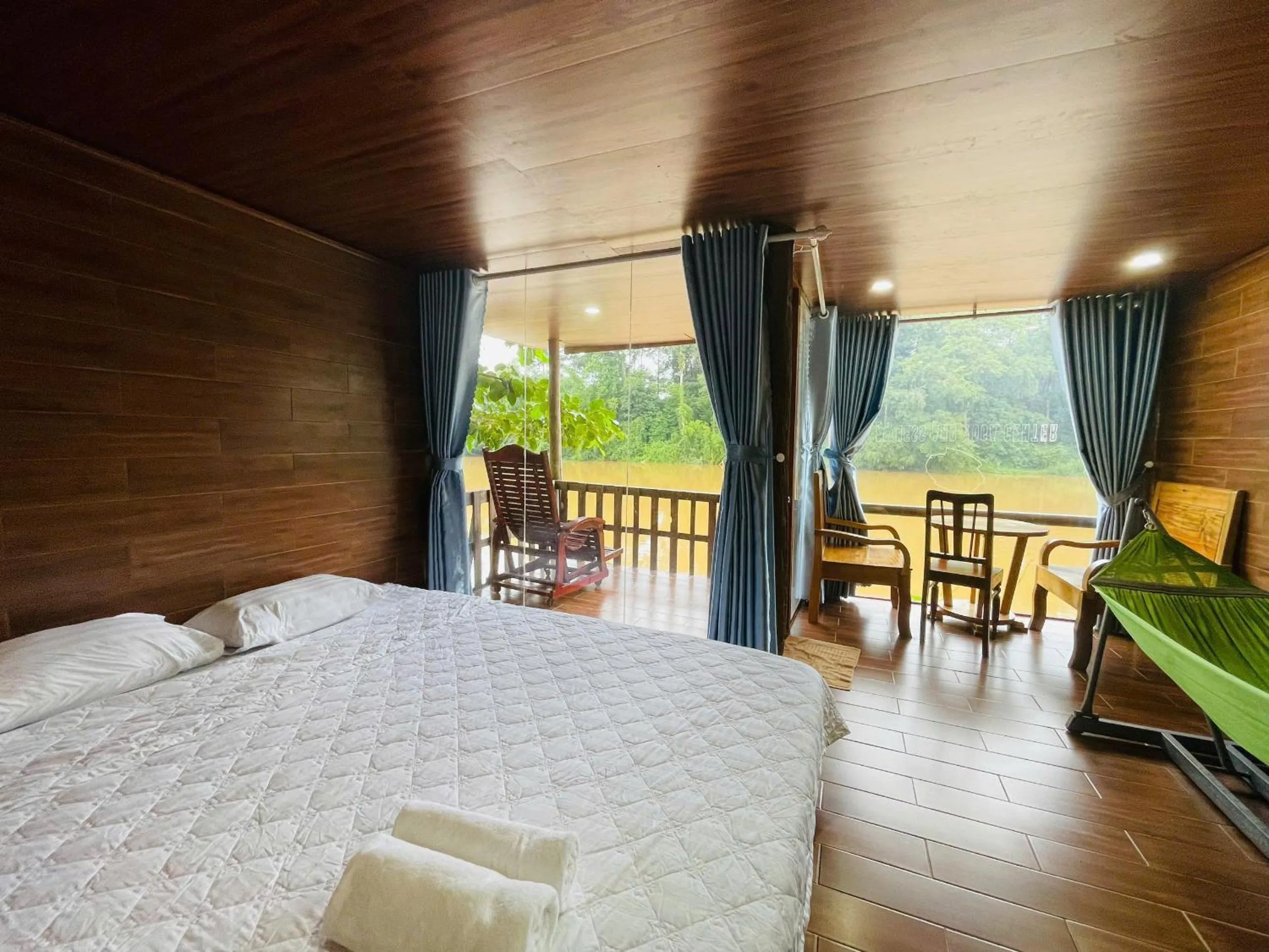 Bed in Green Bamboo Lodge Resort