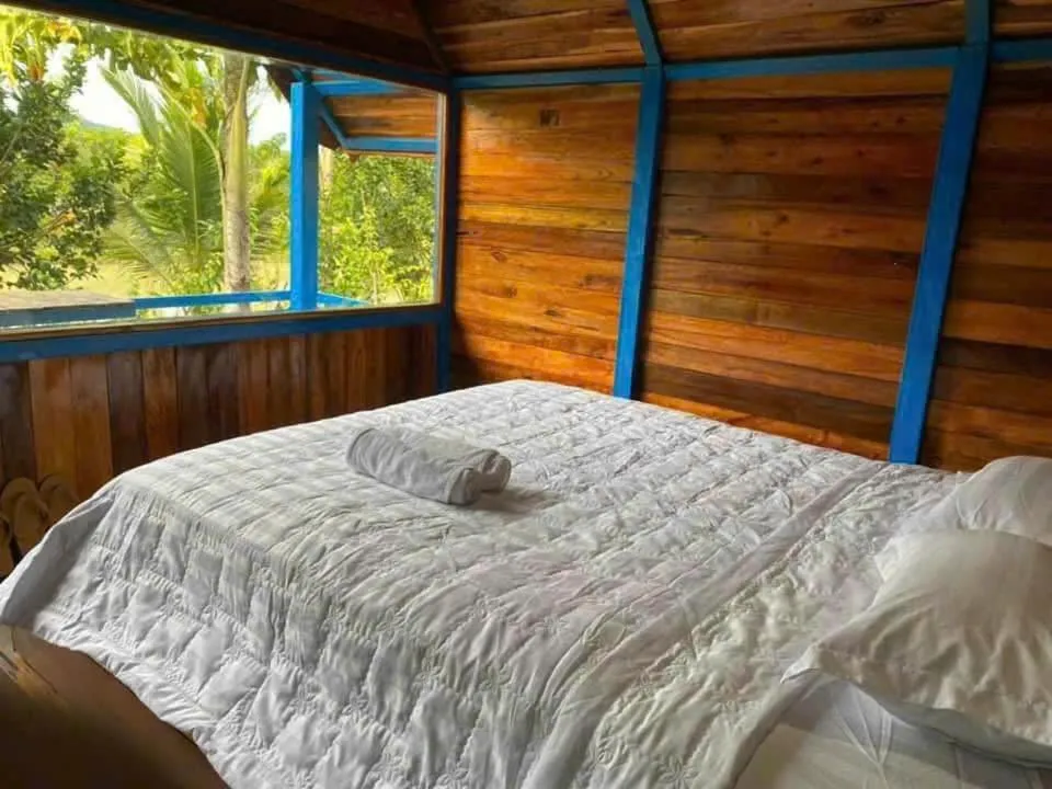 Bed in Green Bamboo Lodge Resort