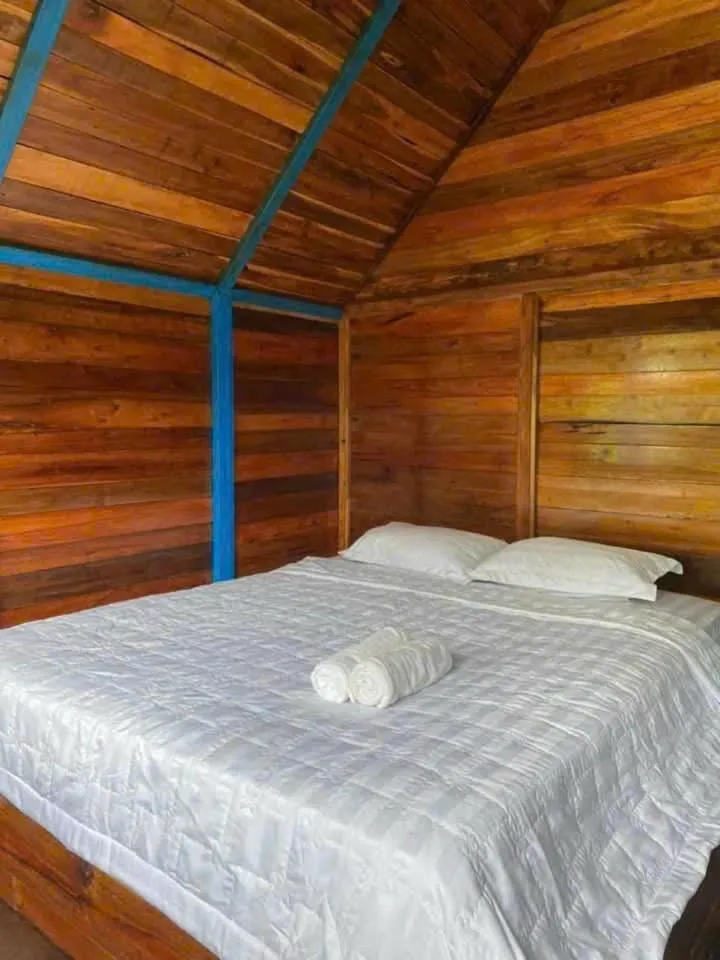Bed in Green Bamboo Lodge Resort