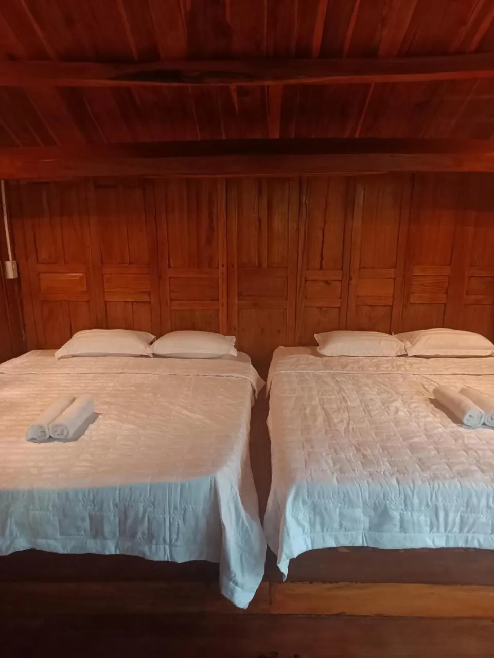 Bed in Green Bamboo Lodge Resort