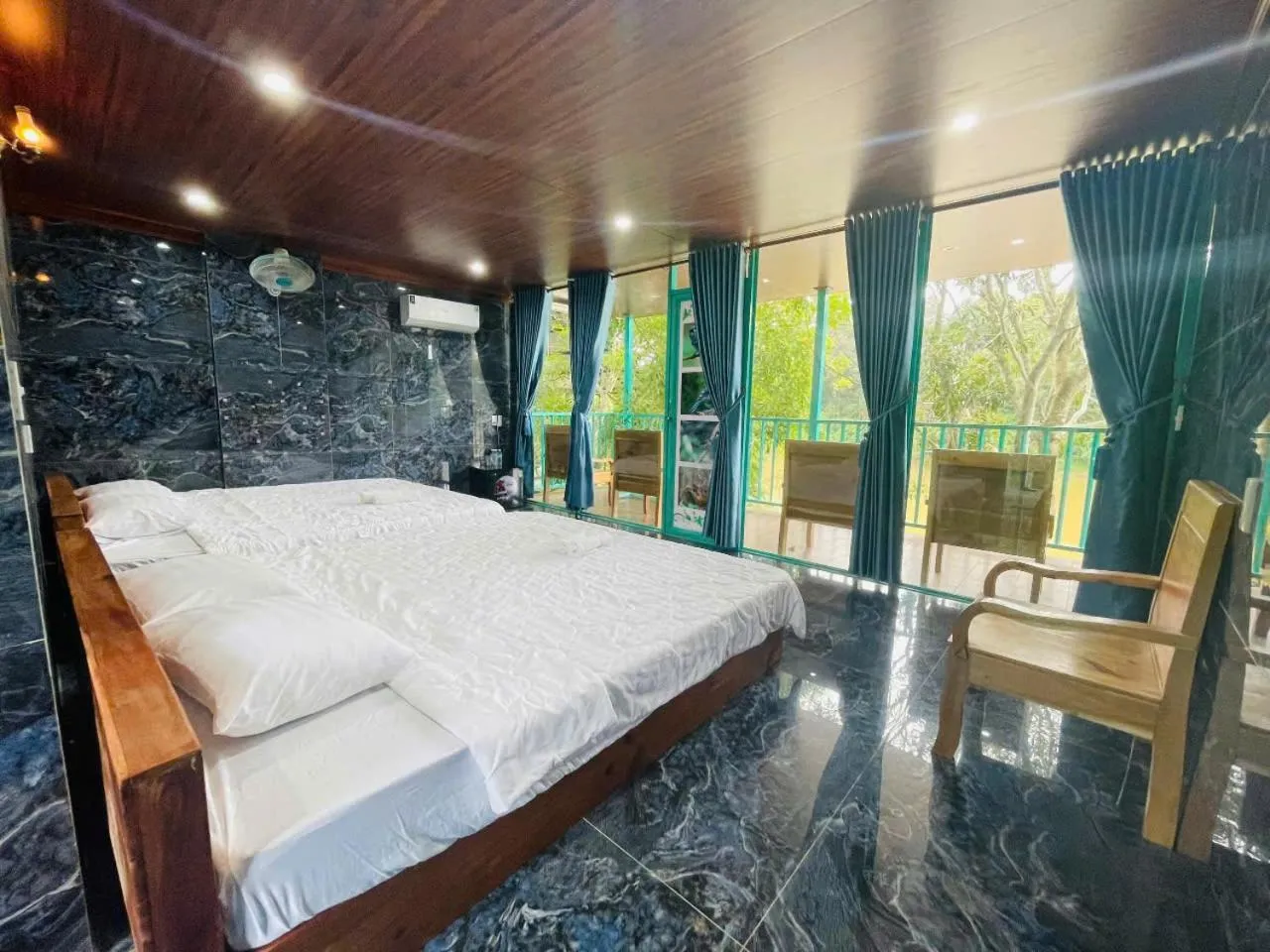 Bed in Green Bamboo Lodge Resort