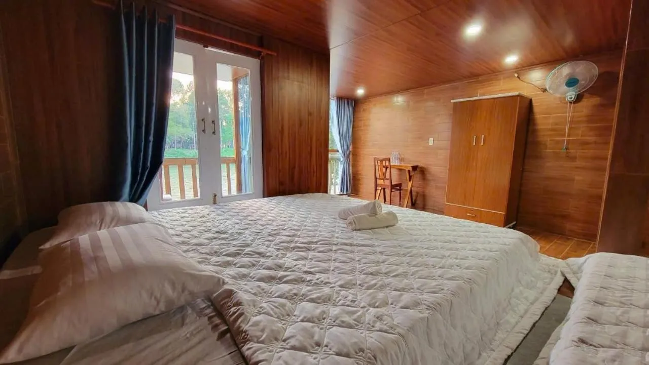 Bed in Green Bamboo Lodge Resort