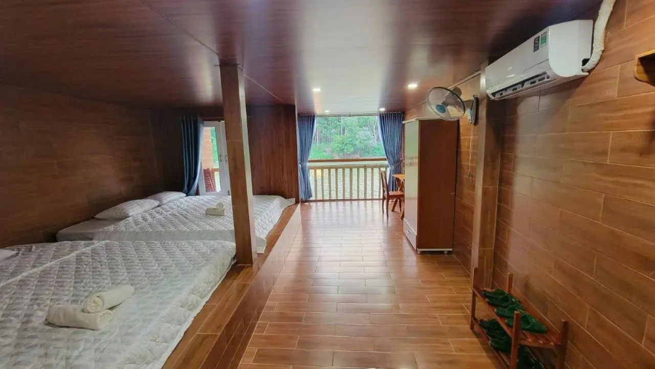 Bed in Green Bamboo Lodge Resort