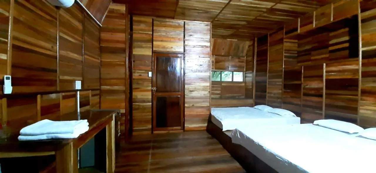 Bed in Green Bamboo Lodge Resort