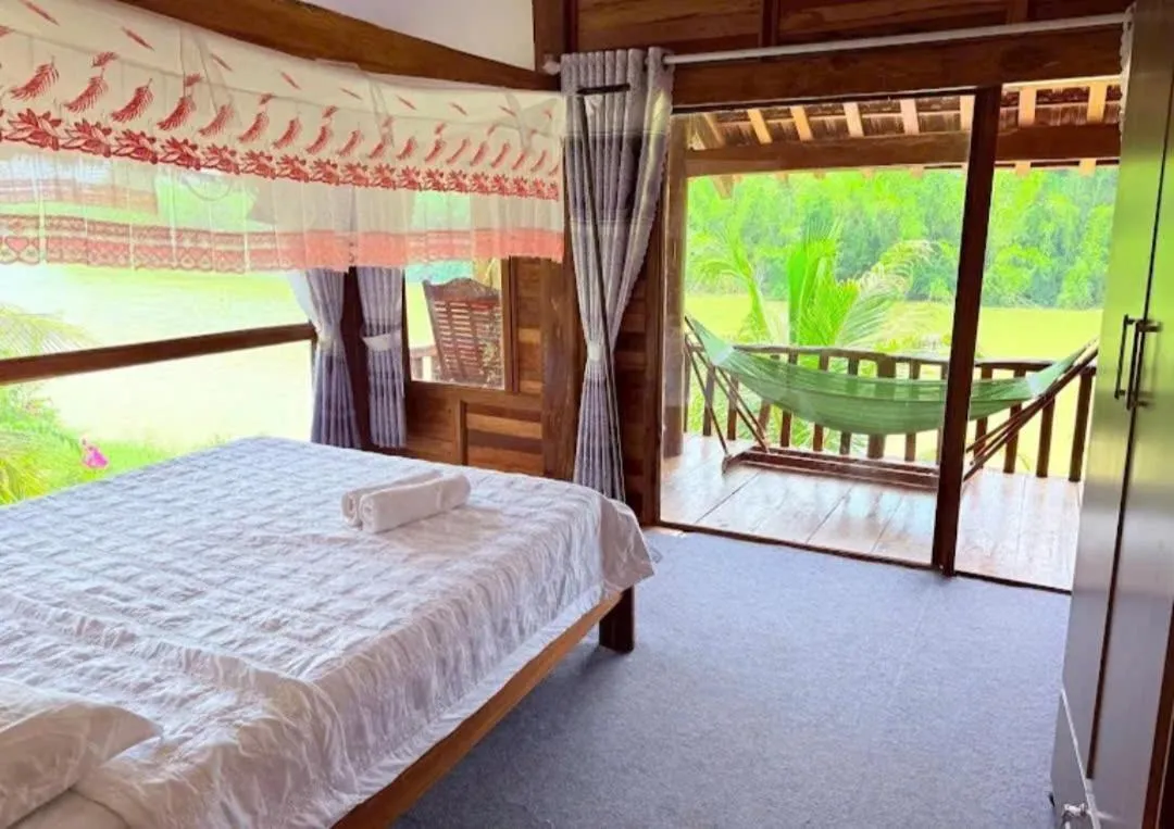 Property building, Bed in Green Bamboo Lodge Resort