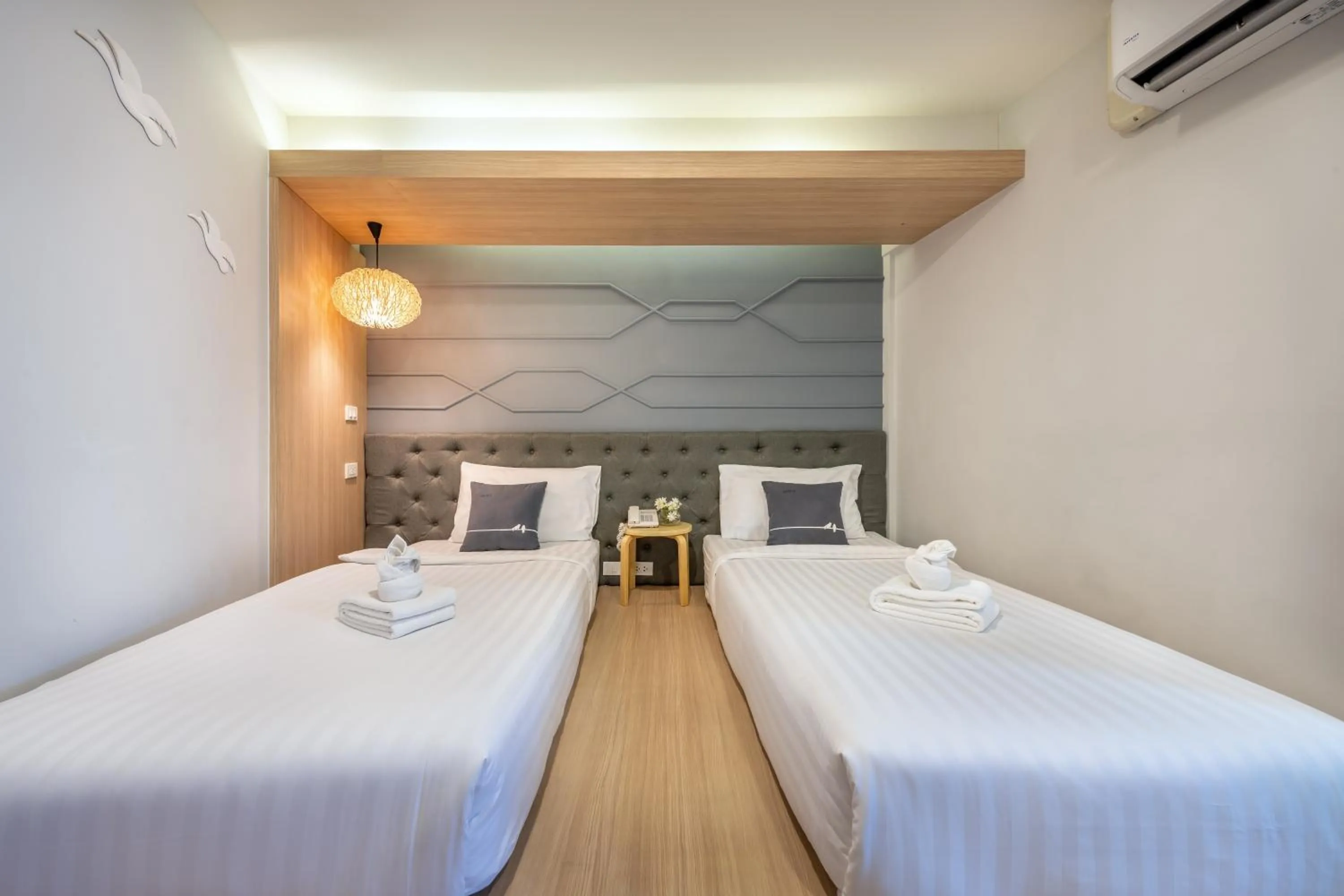 Bed in Tori Prestige Bangkok Hotel