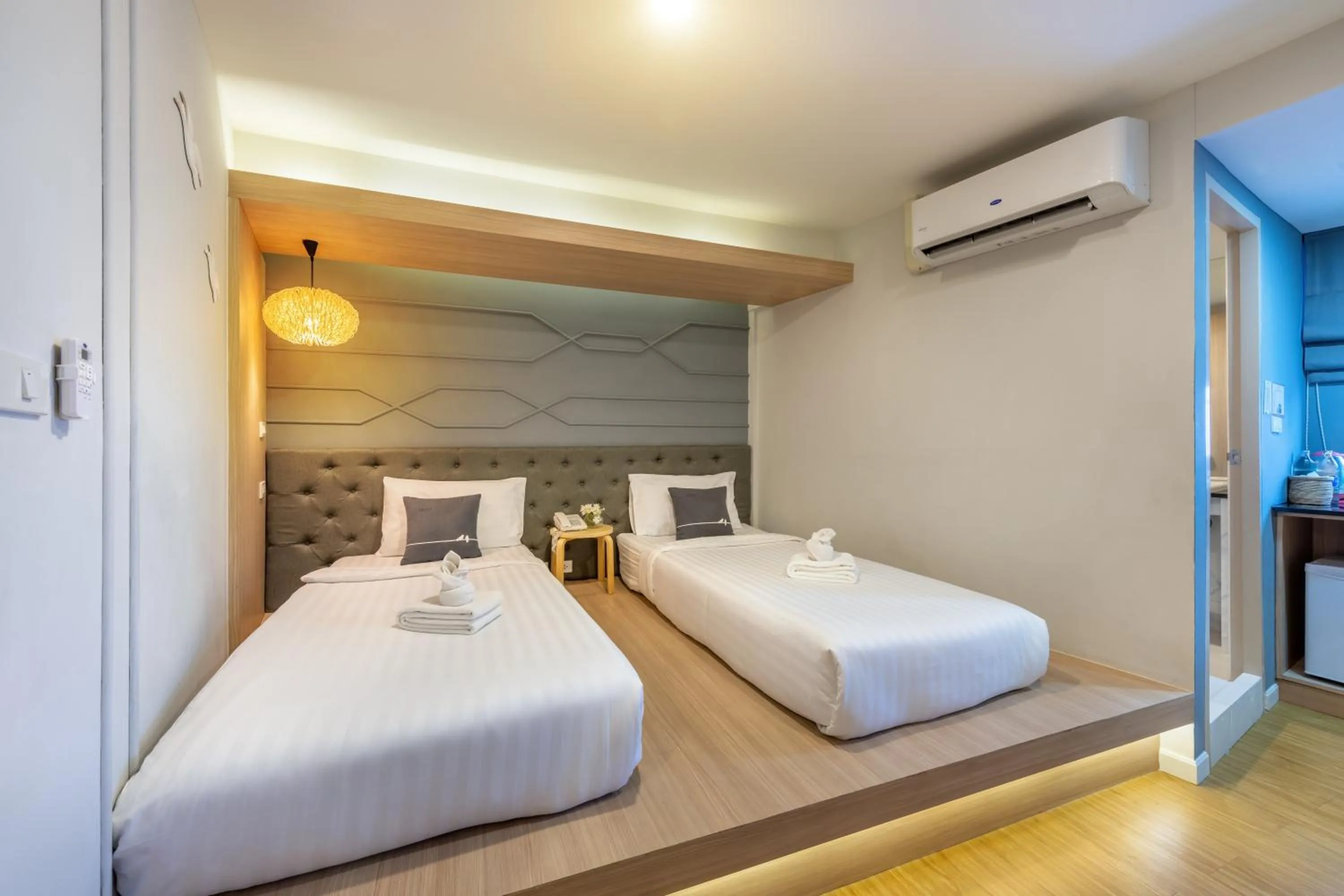 Bed in Tori Prestige Bangkok Hotel